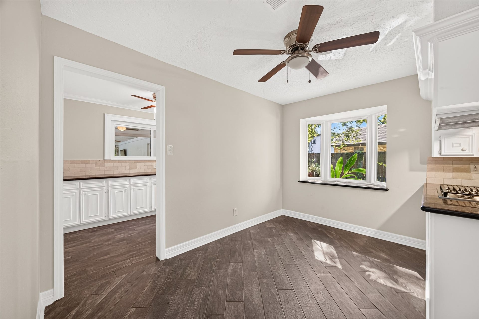 16814 Creeksouth Road, Houston, TX 77068 The breakfast nook is spacious and is overlooked by an beautiful way window with a granite window sill. Perfect for setting up a little herb garden or buffet.