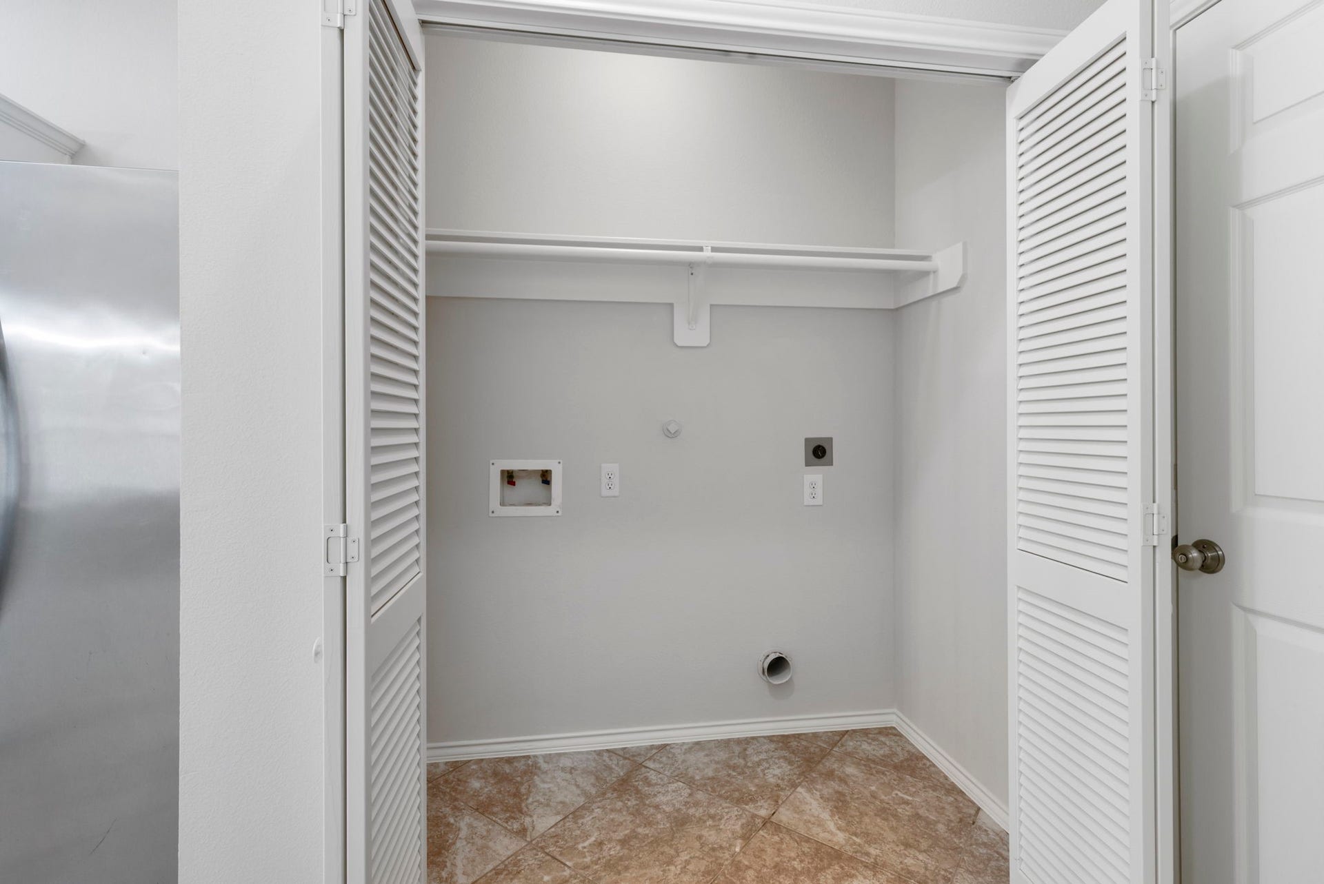 2318 Colonial Springs Lane, Spring, TX 77386 Laundry space inside the home.
