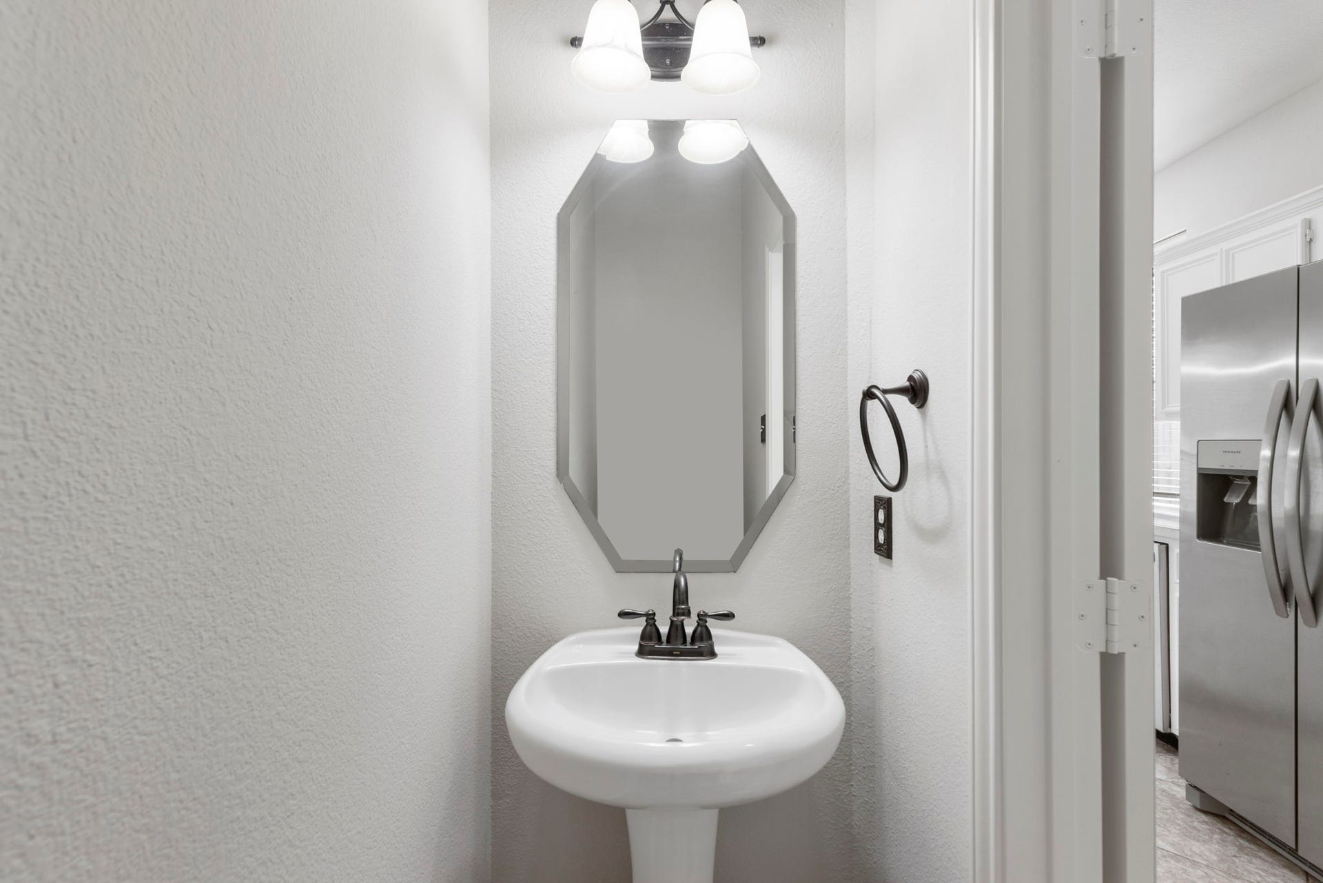 2318 Colonial Springs Lane, Spring, TX 77386 Downstairs half bath.