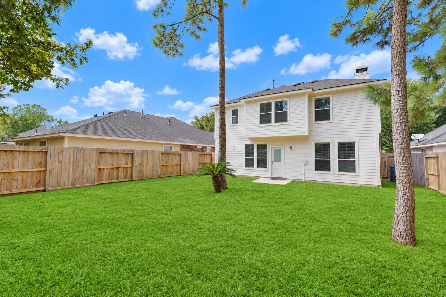 2318 Colonial Springs Lane, Spring, TX 77386 Enjoy your large backyard with mature trees. Grass has been enhanced.