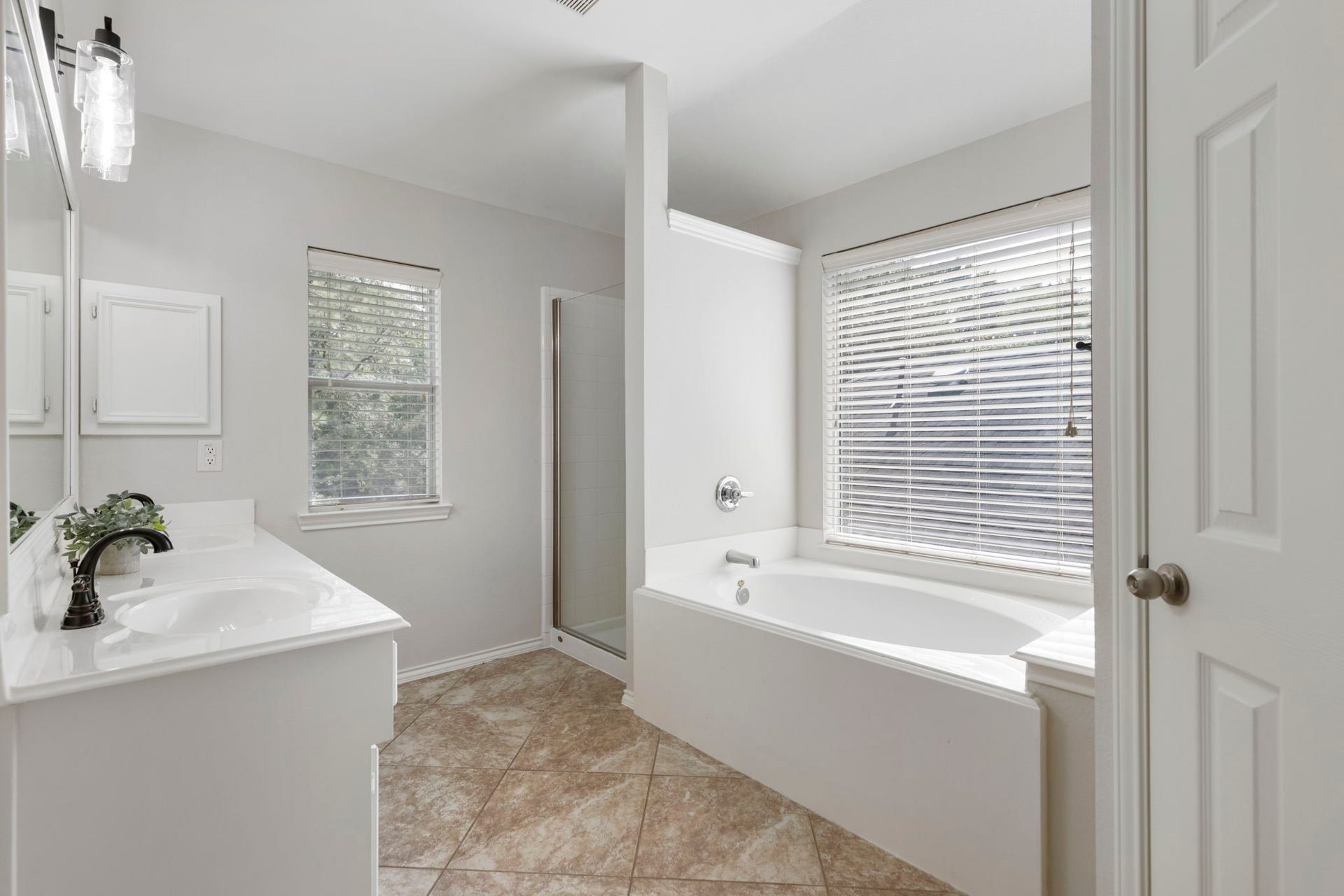 2318 Colonial Springs Lane, Spring, TX 77386 Primary bath has soaking tub and separate shower.