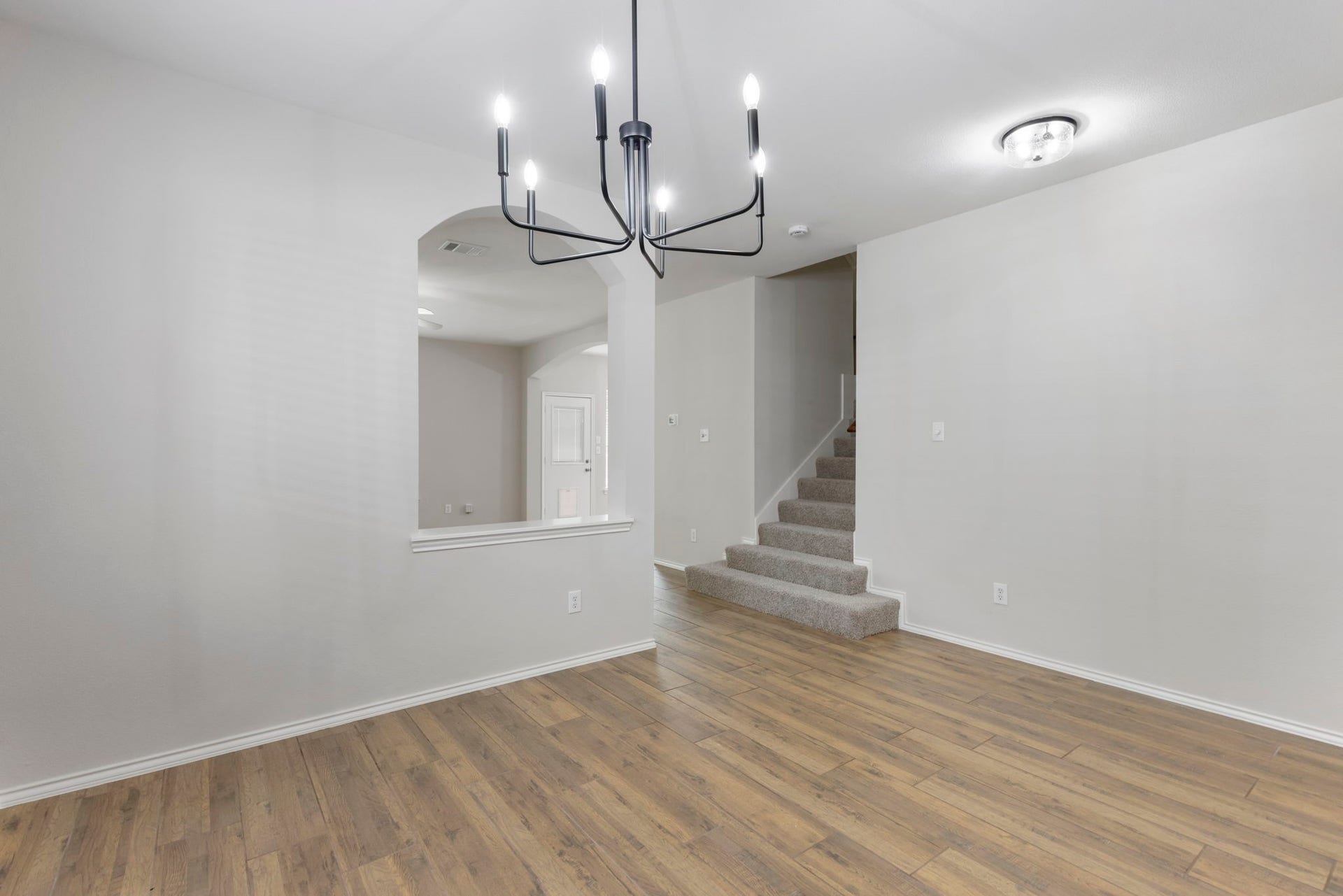 2318 Colonial Springs Lane, Spring, TX 77386 Just past the formal dining space is the living room.