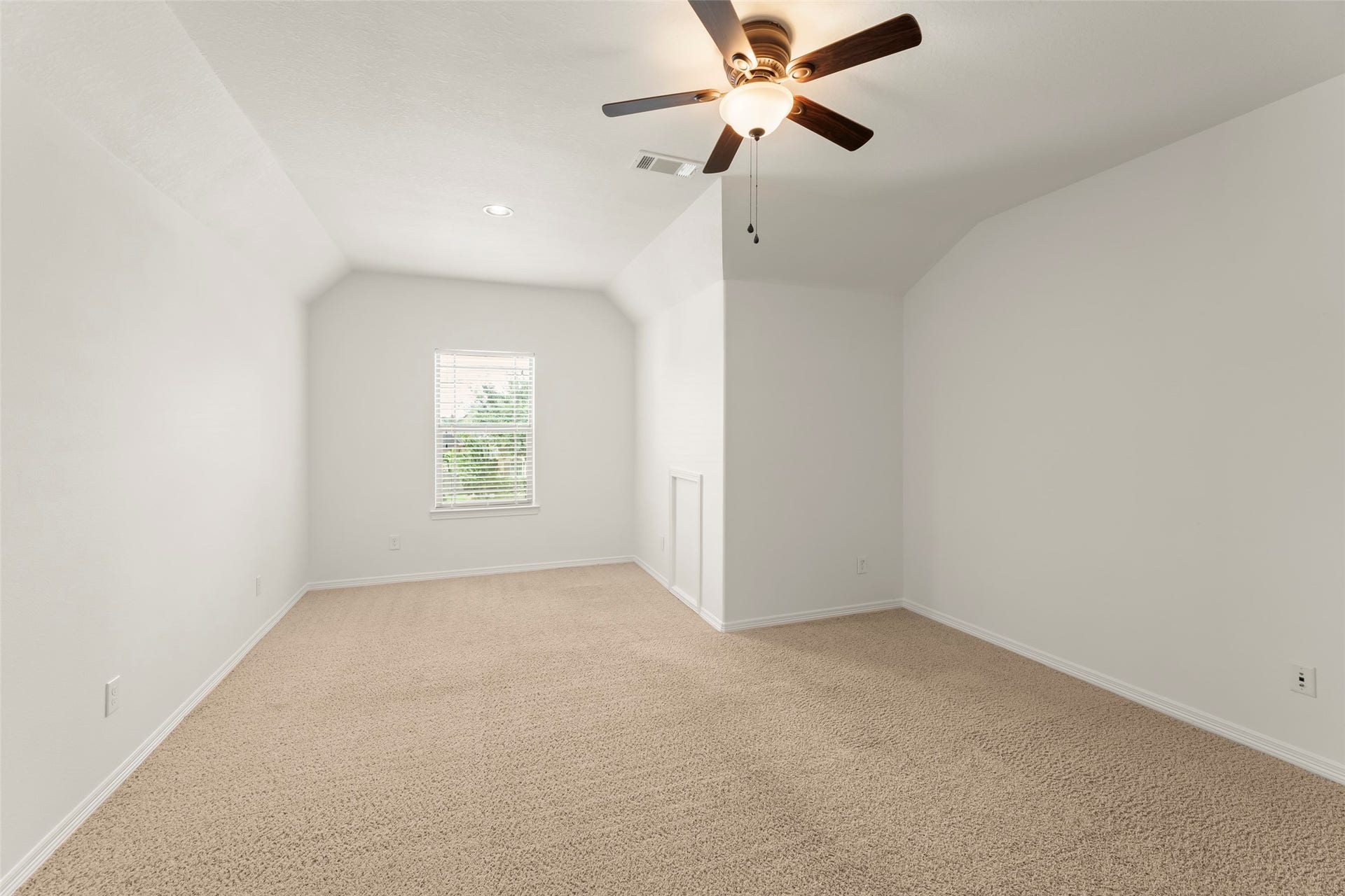 4534 Montcliff Bend Lane, Sugar Land, TX 77479 Modern ceiling fan, and a window allowing natural light to fill the space.