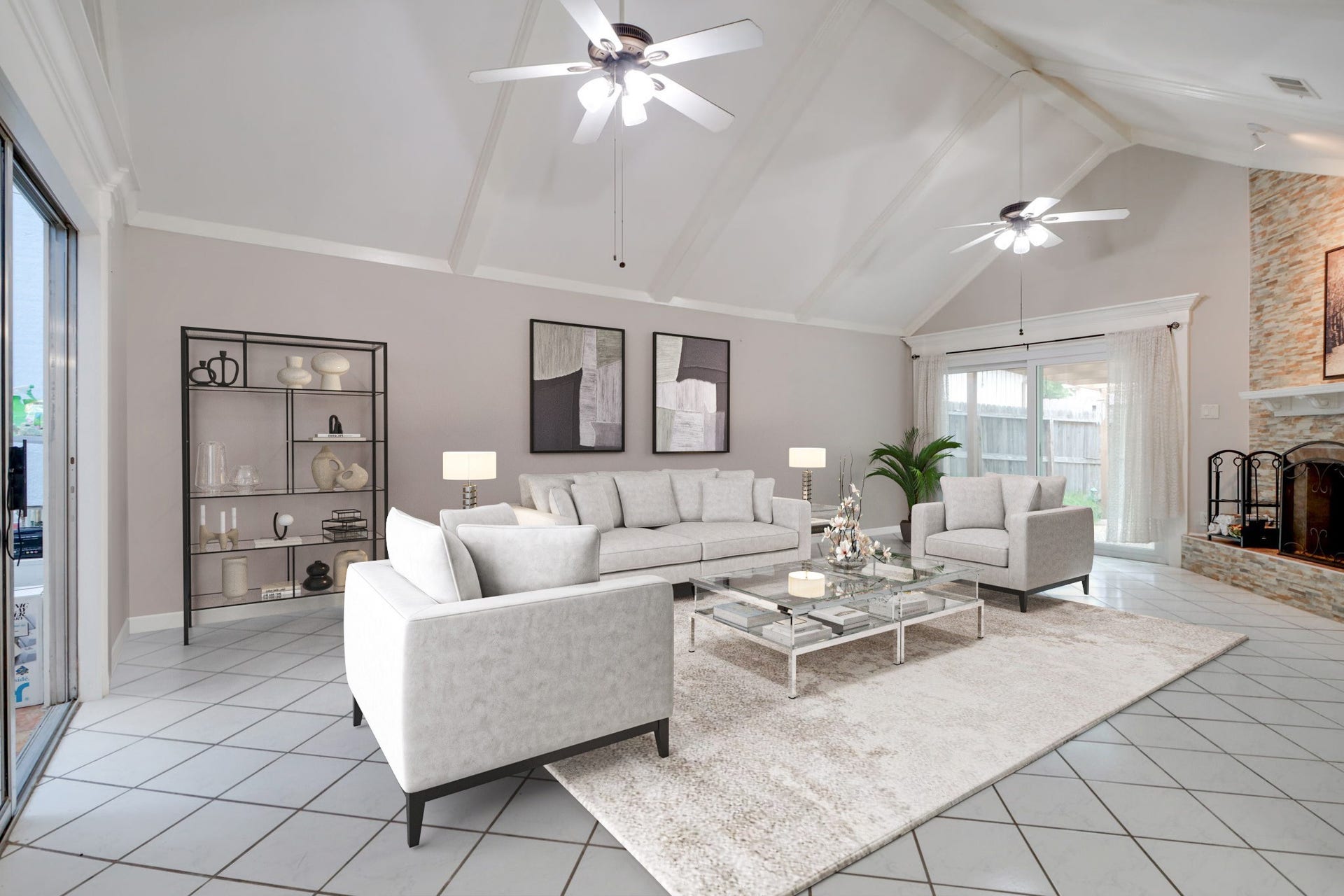 2912 Camelot Lane, Missouri City, TX 77459 Virtually staged; furniture and dcor have been digitally added for illustration. Imagine gathering in this spacious living room beneath vaulted ceilings and exposed beams, with the floor-to-ceiling stone fireplace as a welcoming centerpiece. The staged arrangement illustrates seating possibilities, while tile flooring and sliding glass doors connect the room to the private patio.