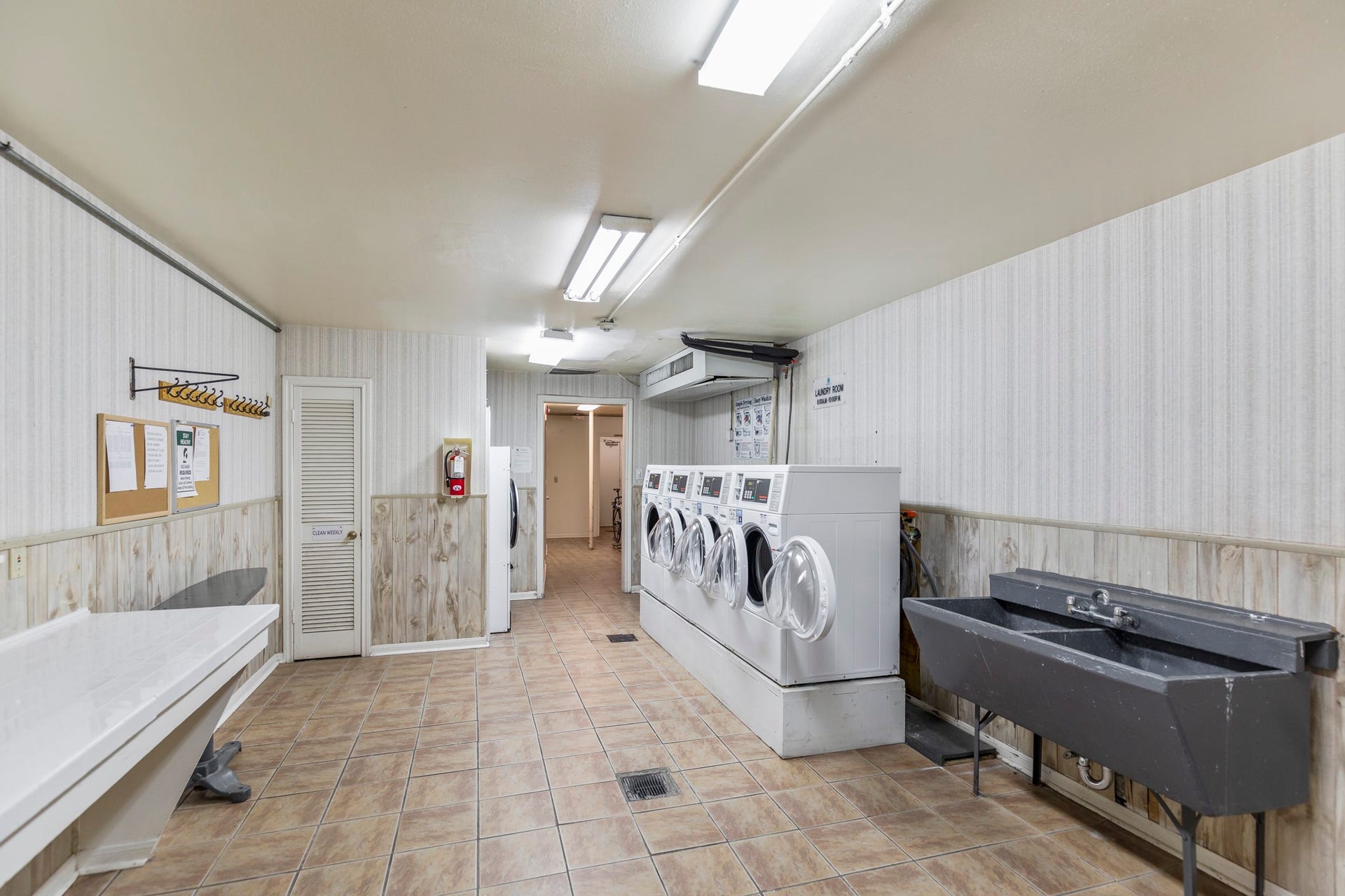 2601 Bellefontaine Street, #C104, Houston, TX 77025 Building laundry area steps away