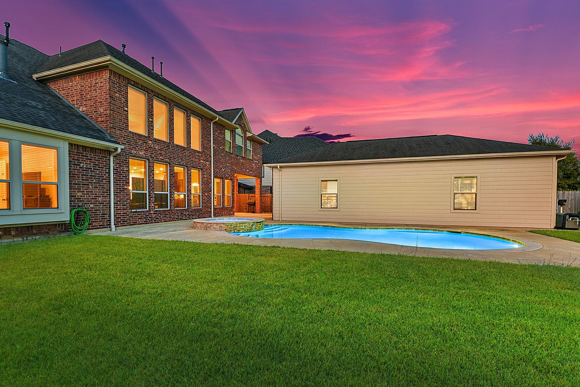 27411 Gladway Manor Drive, Katy, TX 77494 This home truly has it all, featuring a heated pool and spa, an approximately 800 sq. ft. detached workshop, and plenty of green space for outdoor activities and enjoymentall with the added privacy of no back neighbors.