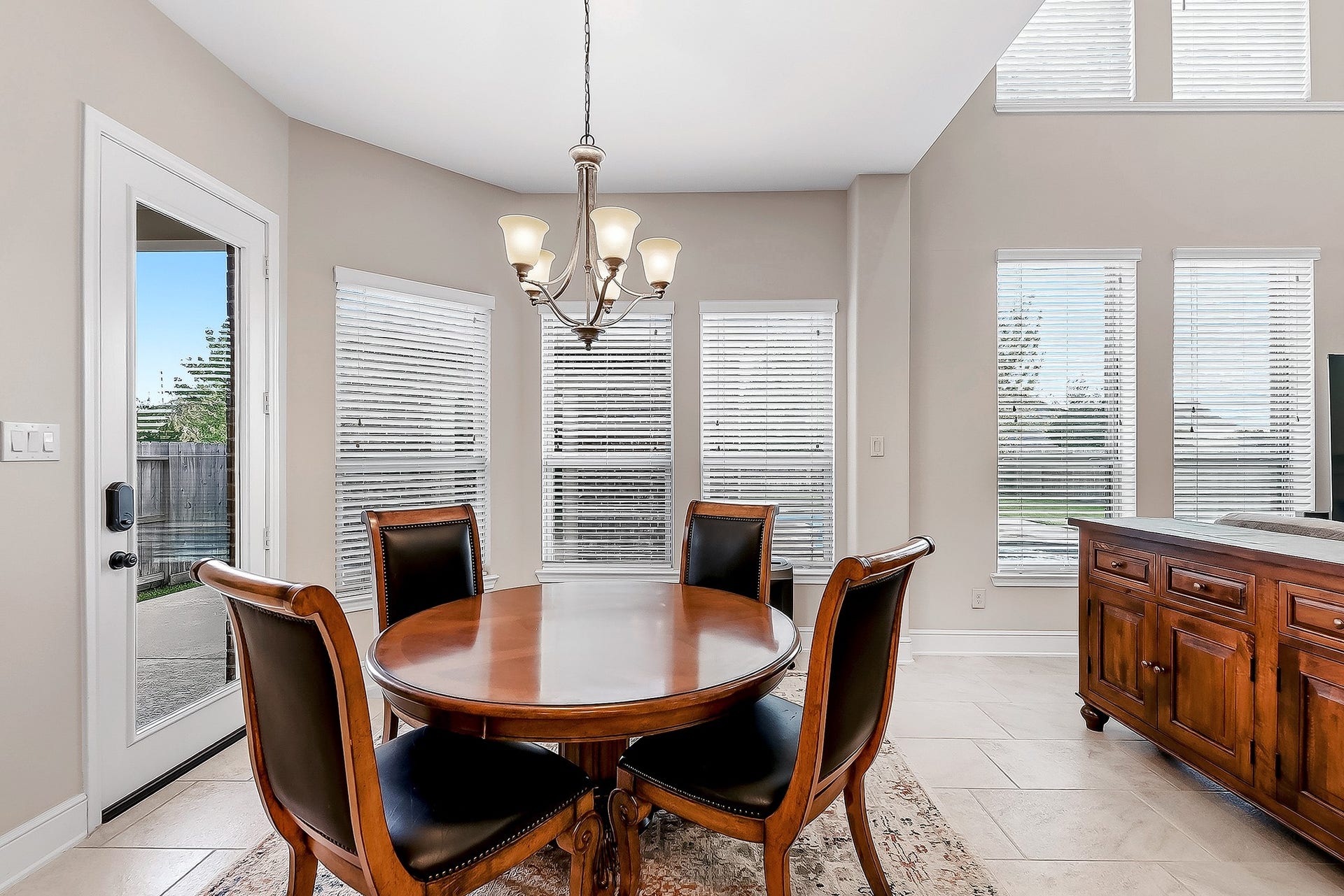27411 Gladway Manor Drive, Katy, TX 77494 The large breakfast room offers easy access to the island kitchen and plenty of space for a larger dining table if desired. Bay-style, floor-to-ceiling windows and a glass back door provide beautiful views and easy access to the covered patio and pool, making outdoor entertaining and BBQs a breeze. The spacious island kitchen offers ample room for meal preparation or multiple chefs, making it ideal for gatherings and cooking together.
