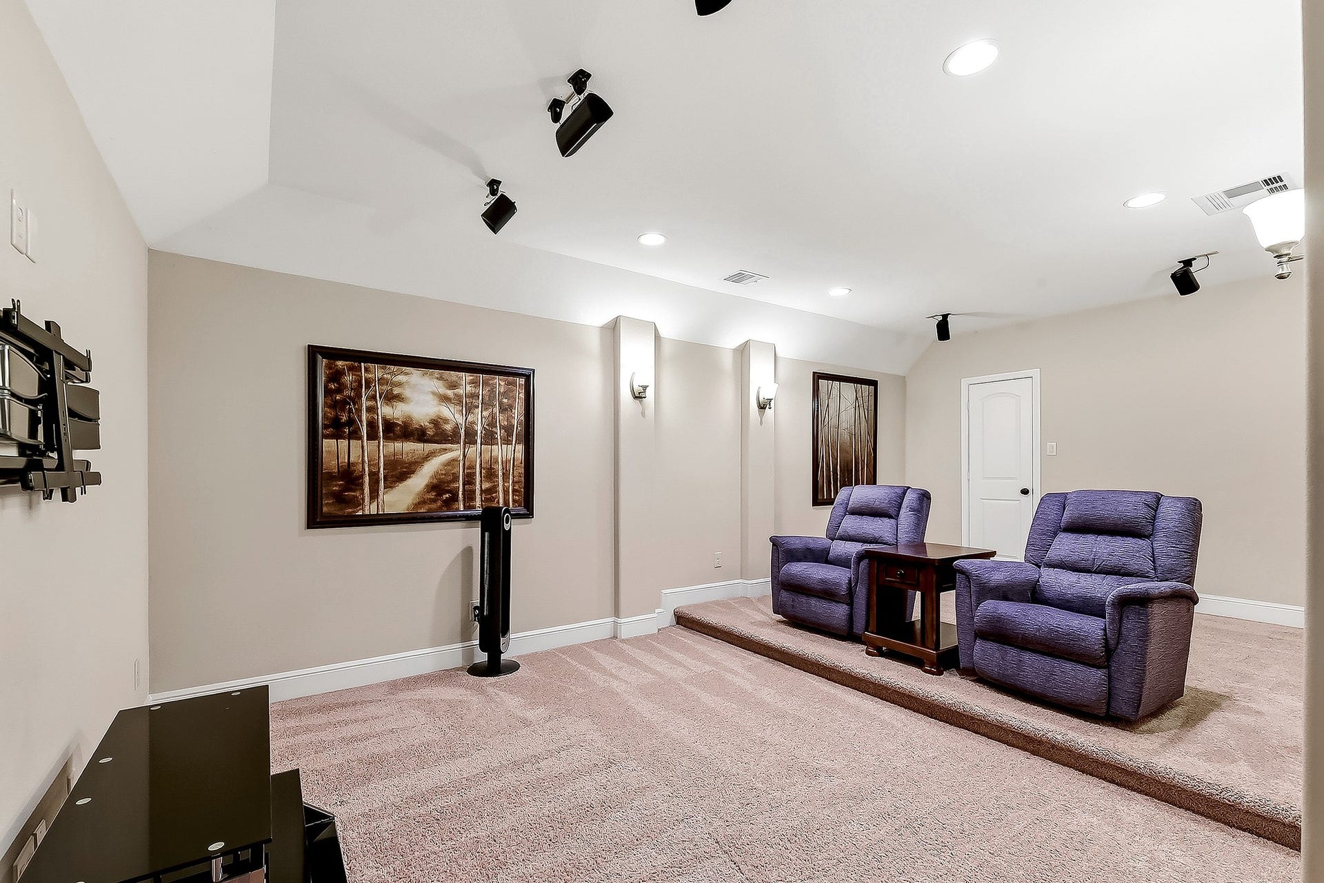 27411 Gladway Manor Drive, Katy, TX 77494 Another view of this spacious media room reveals its versatility, with plenty of room for a home office, oversized closet, or additional furnishings. If a fifth bedroom is needed, this room offers an excellent opportunity for conversion to suit your needs.