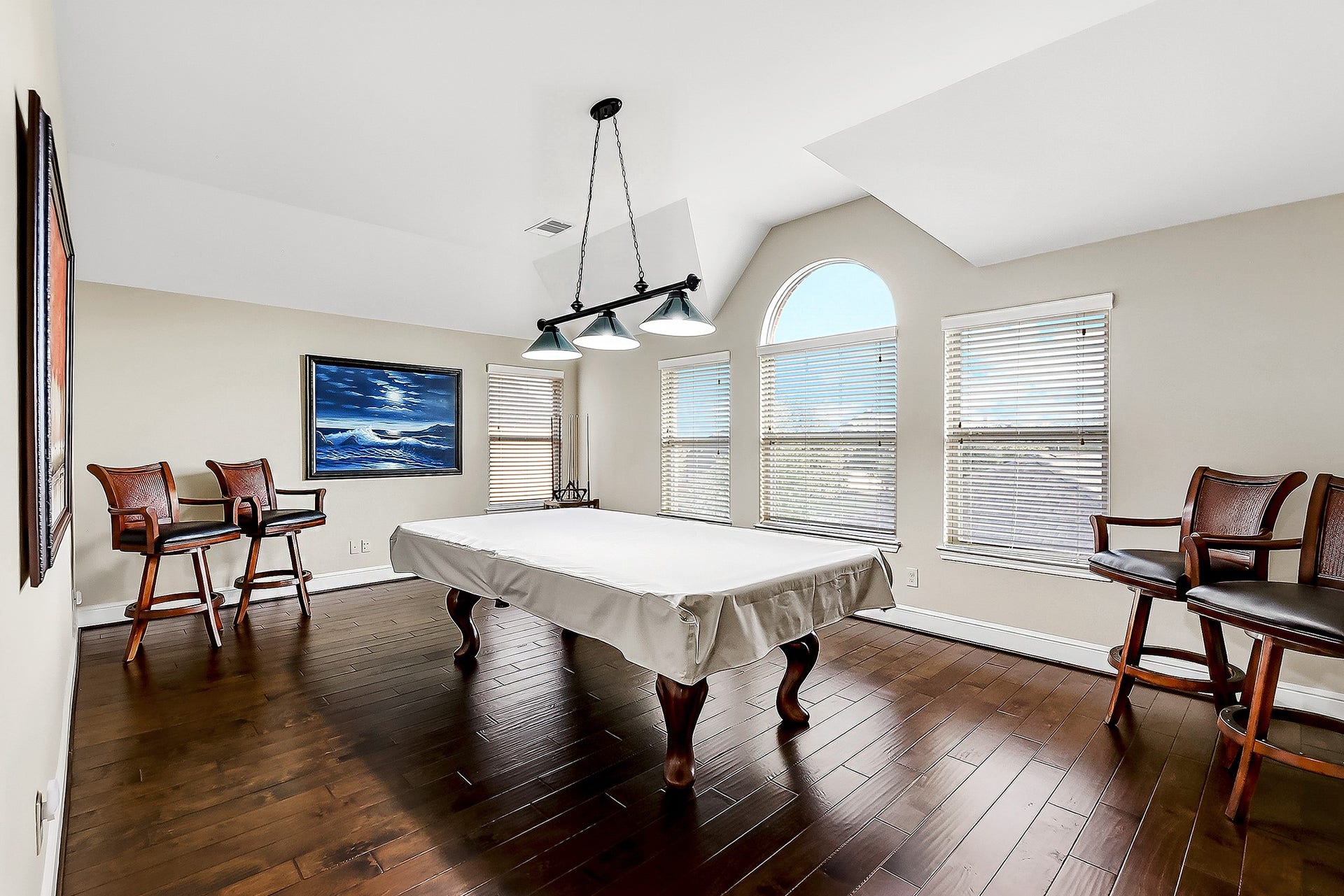 27411 Gladway Manor Drive, Katy, TX 77494 Upstairs, youll find a spacious game room and media room, along with two generously sized guest bedrooms that share a convenient Hollywood-style bathroom. An additional guest bedroom features its own private full bathroom, providing comfort and privacy for family and guests. The spacious game room features the same engineered hardwood flooring found throughout the home and offers plenty of space for a pool table, game room furnishings, and additional seating. Its the perfect space for entertaining.