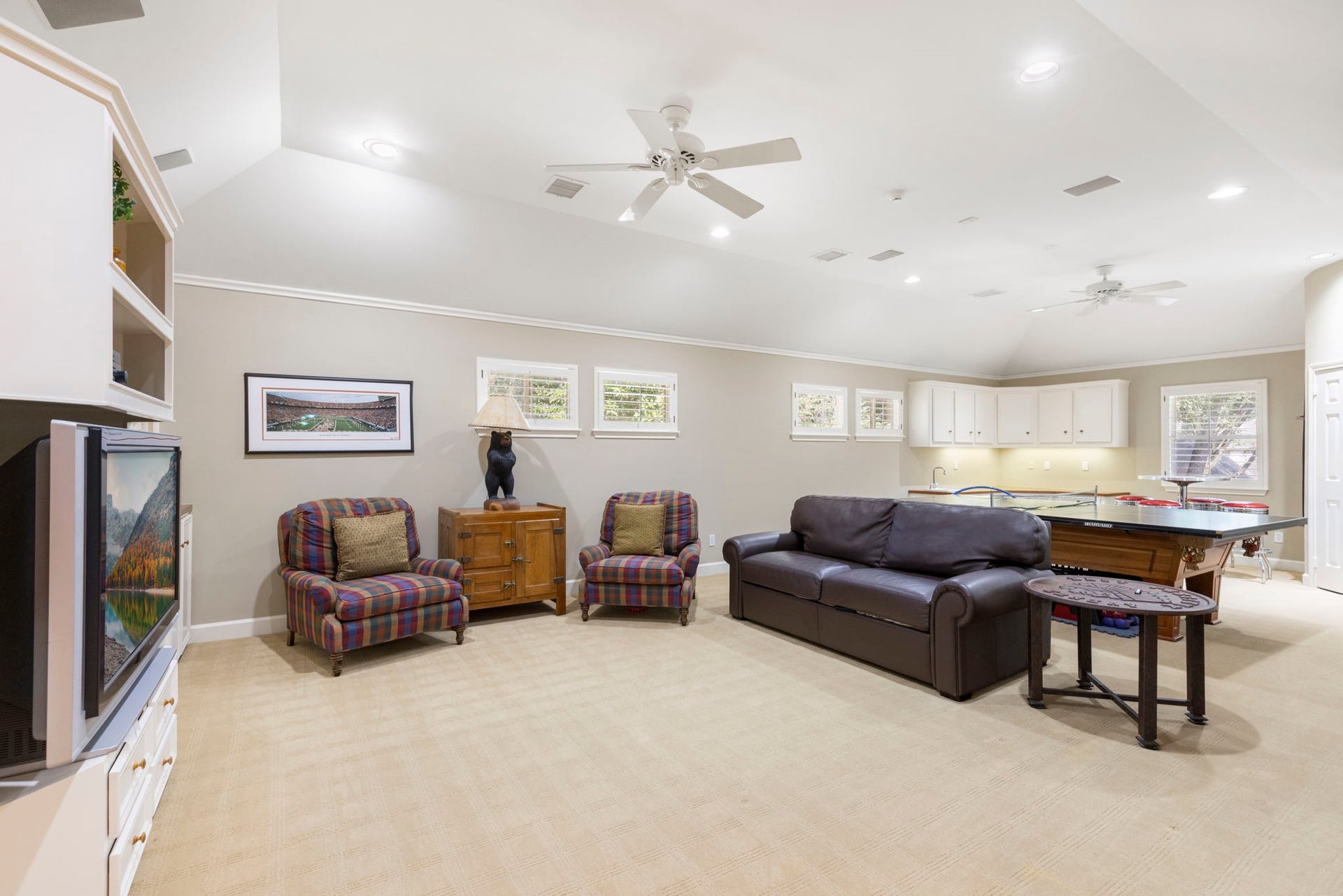 14018 Court Of Regents, Houston, TX 77069 Added above the garage, the expansive game room creates a versatile destination for recreation, movie nights, and larger gatherings.
