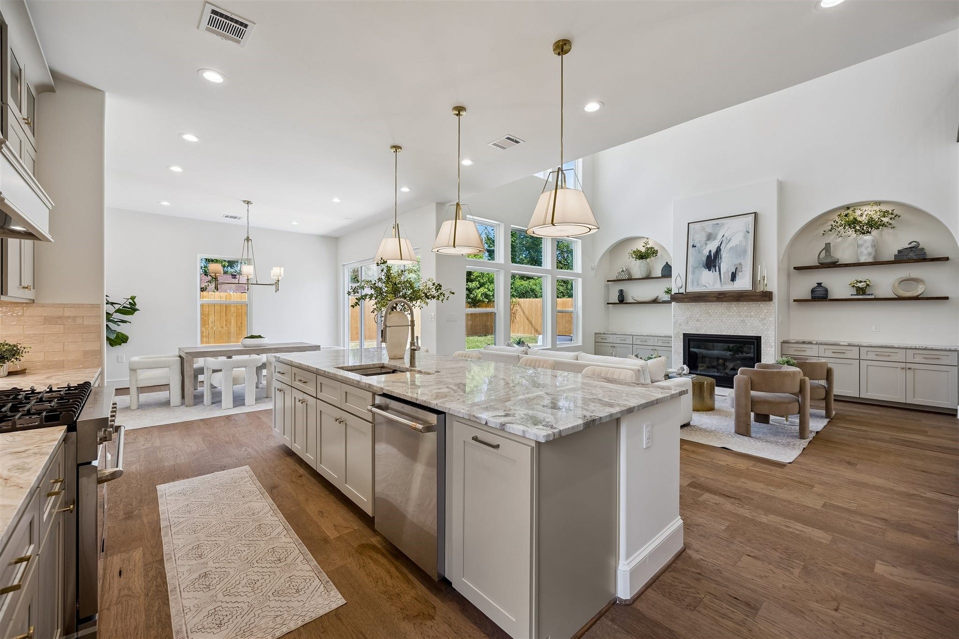 Gourmet kitchen with extra large 36" gas range, abundant storage, coffee bar, and breakast bar