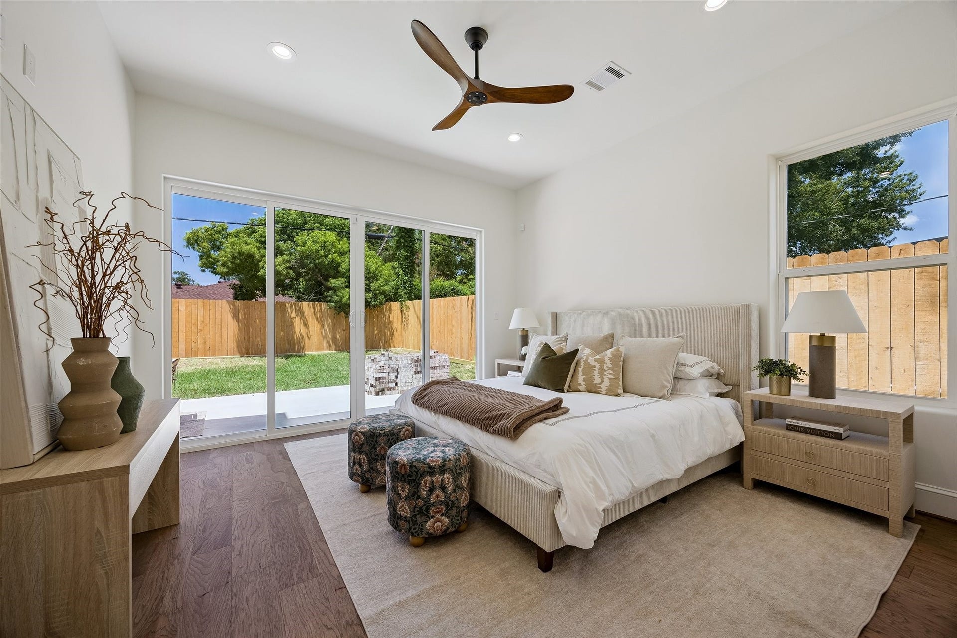 Primary bedroom on first floor with tons of natural light