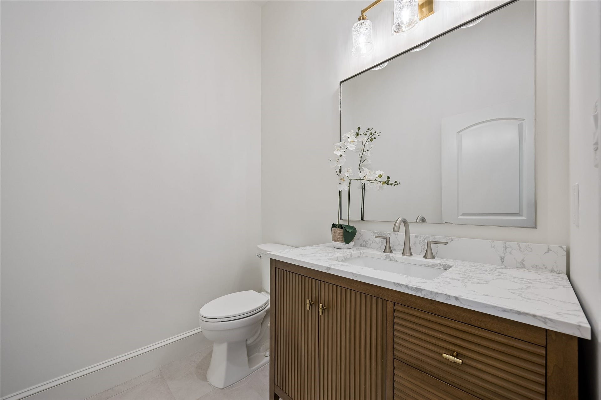 Half powder bath on first floor for guests