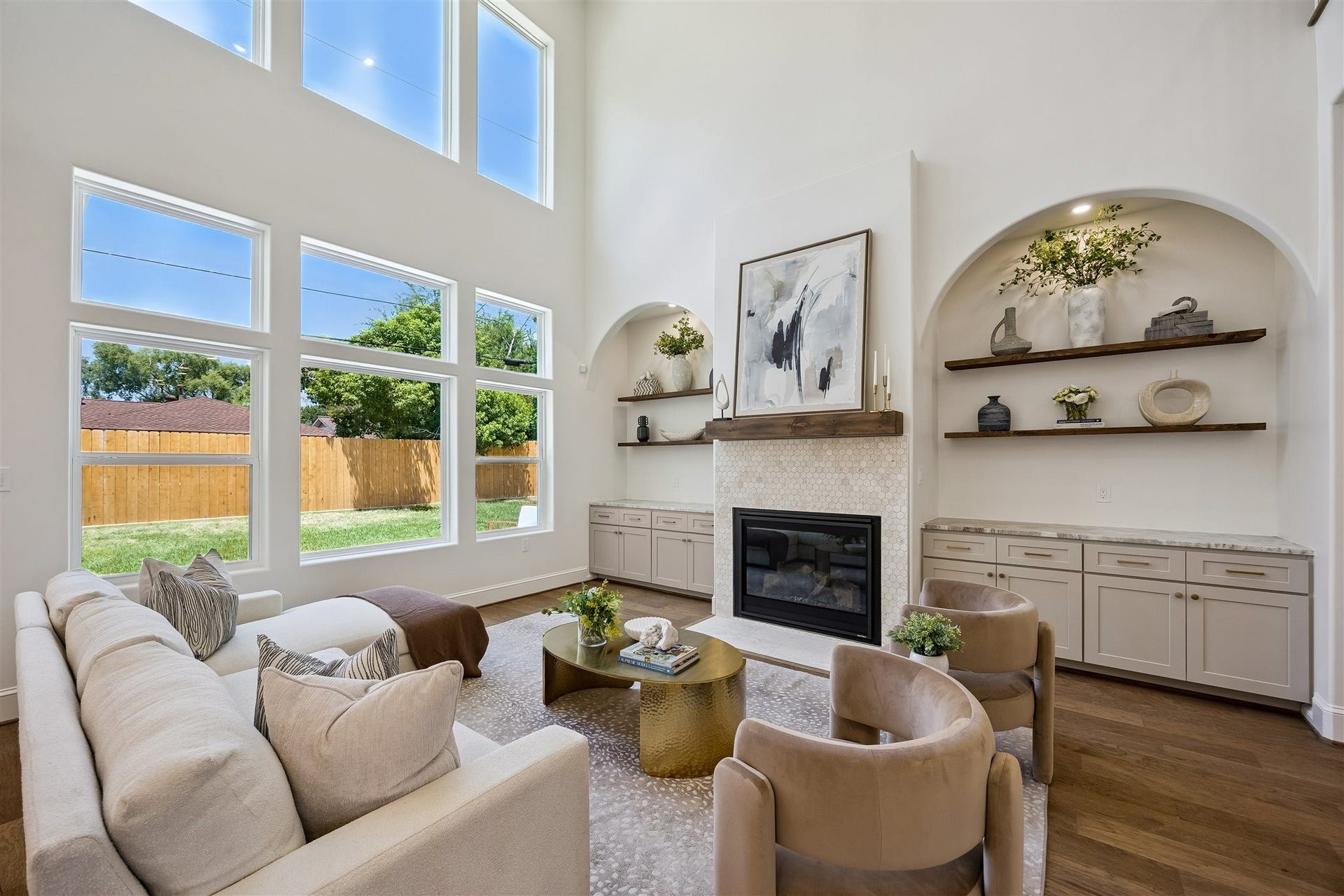 Gorgeous living room on 1st floor perfect for entertaining and off of kitchen with a gas log fireplace