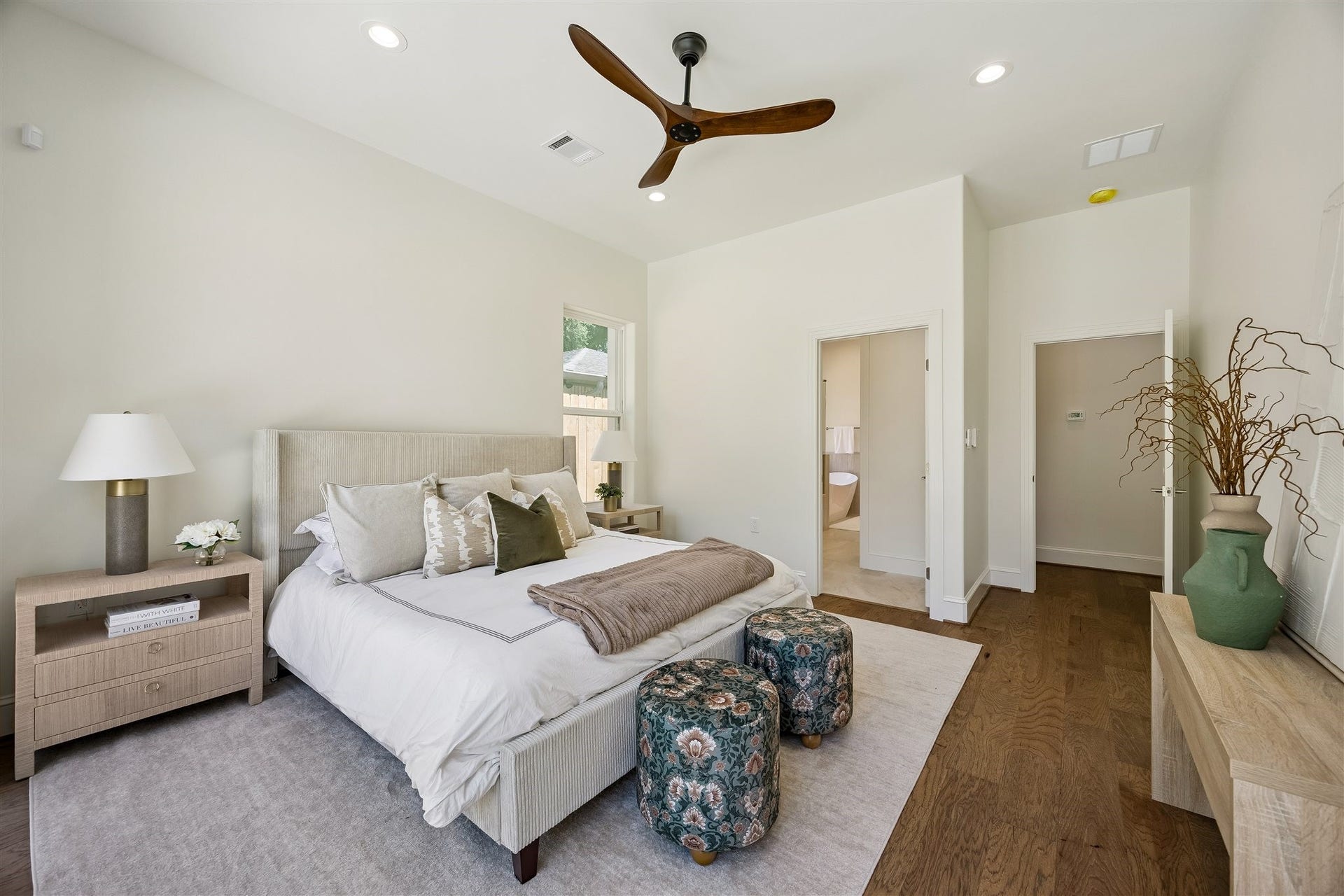 Primary bedroom on first floor with tons of natural light