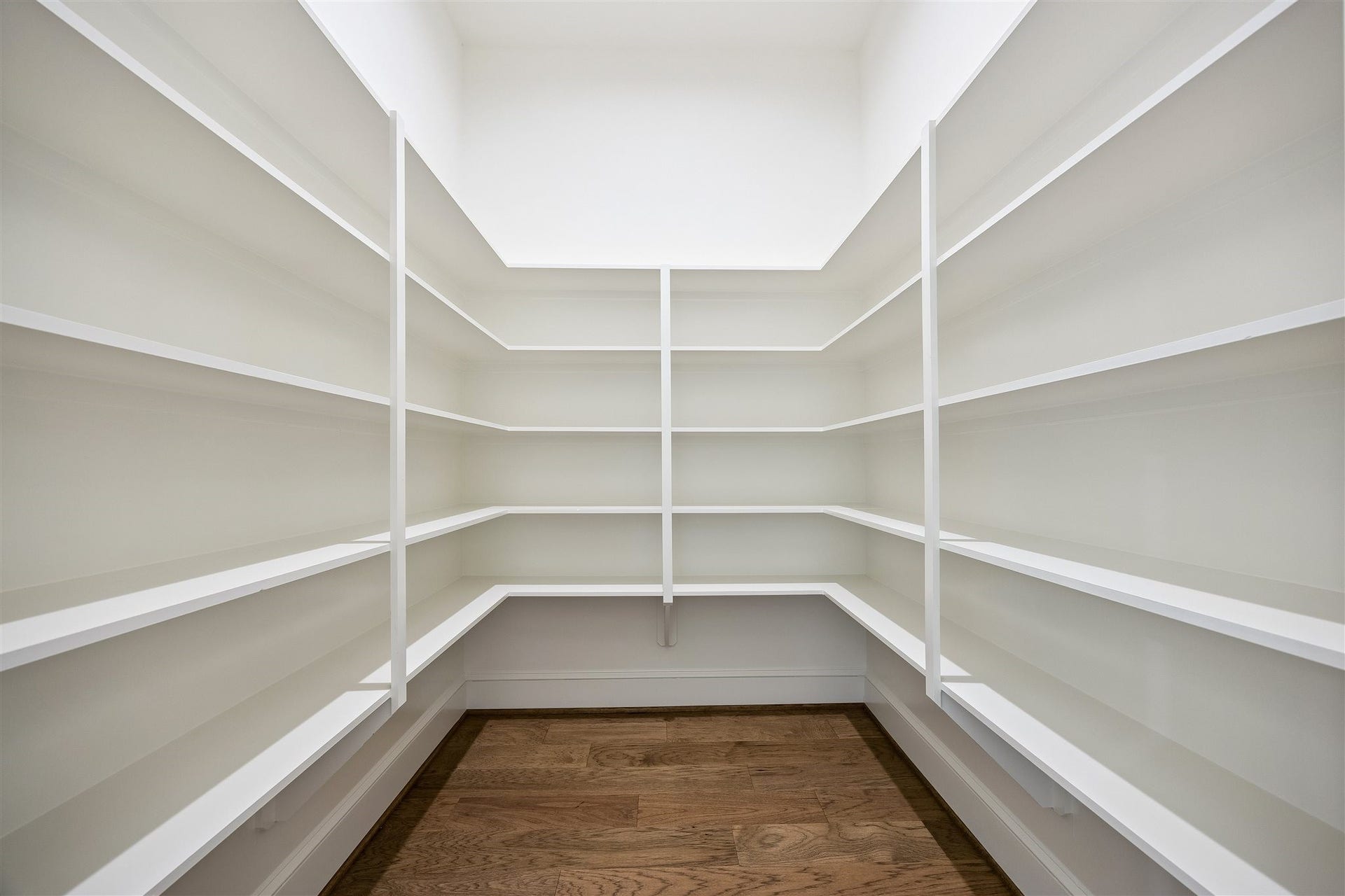 Spacious walk-in pantry off of kitchen