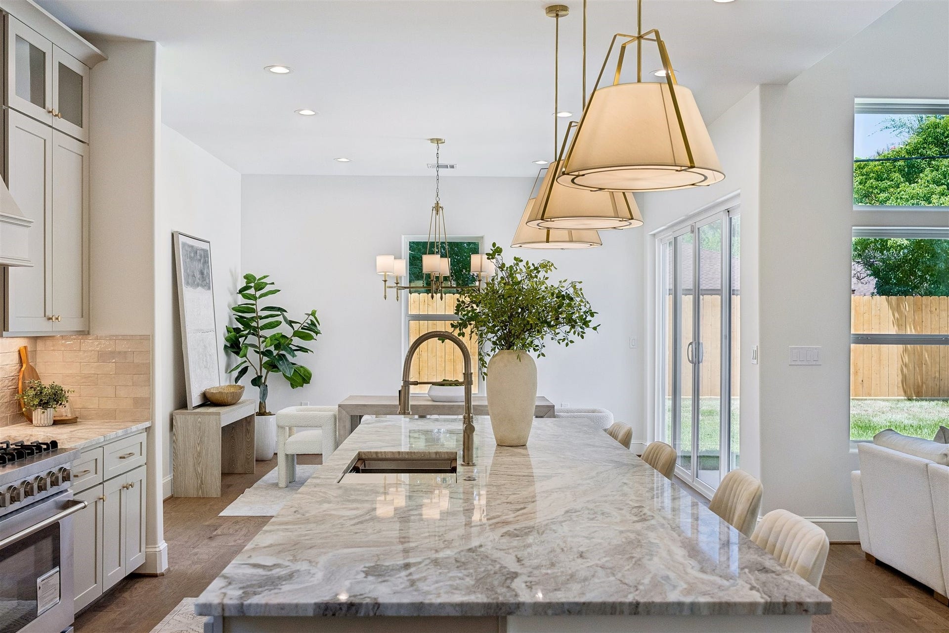 Gourmet kitchen with extra large 36" gas range, abundant storage, coffee bar, and breakast bar