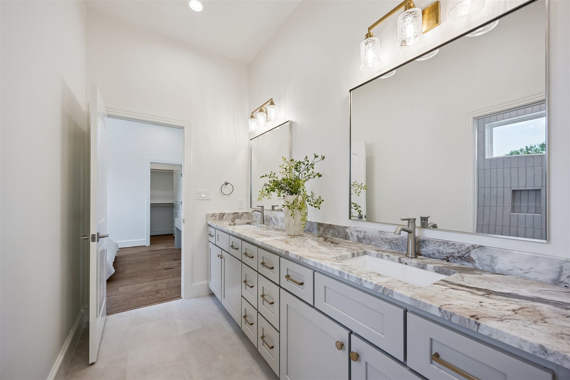 Jack-and-jill bathroom with double sinks between 3rd and 4th bedrooms