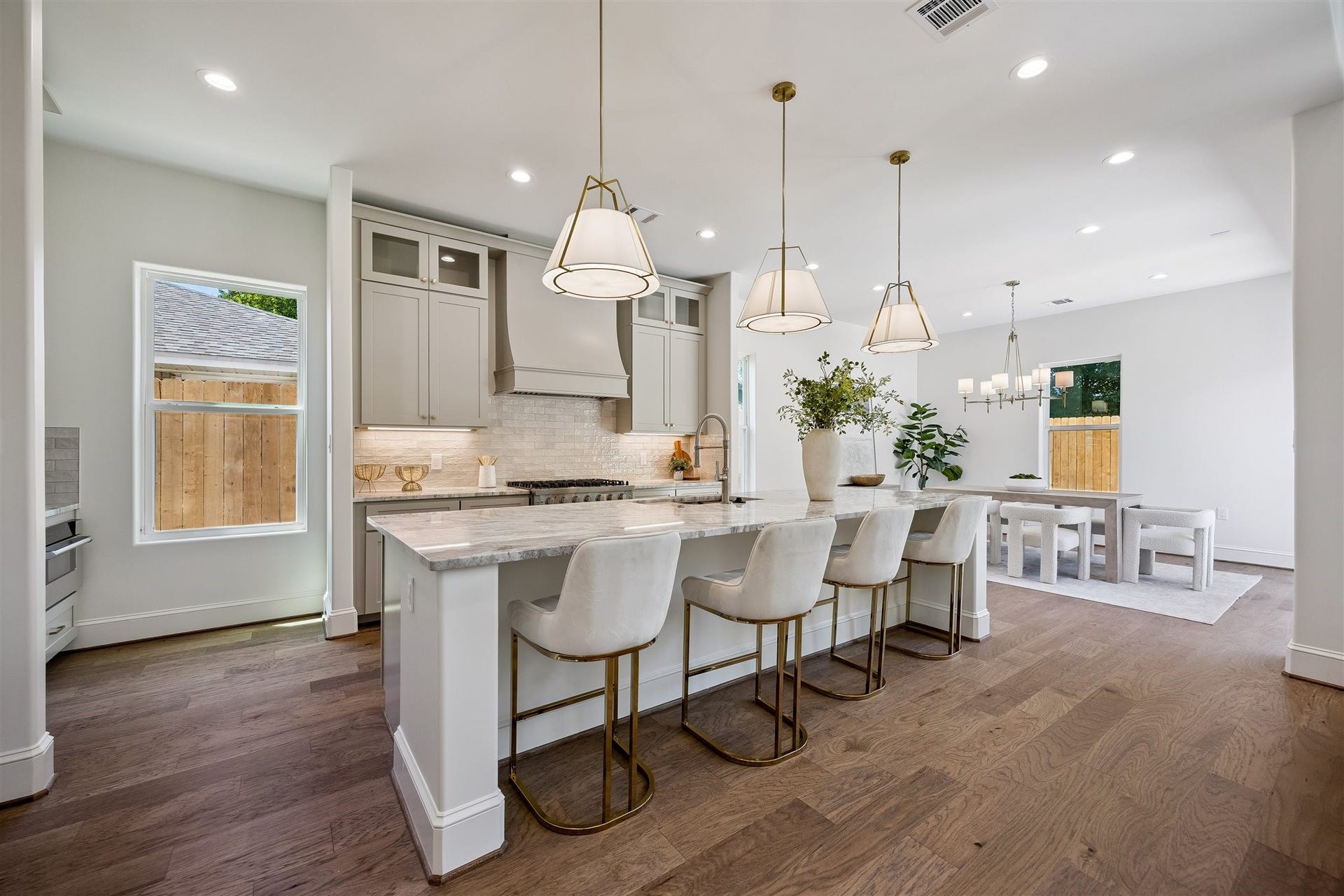 Gourmet kitchen with extra large 36" gas range, abundant storage, coffee bar, and breakast bar