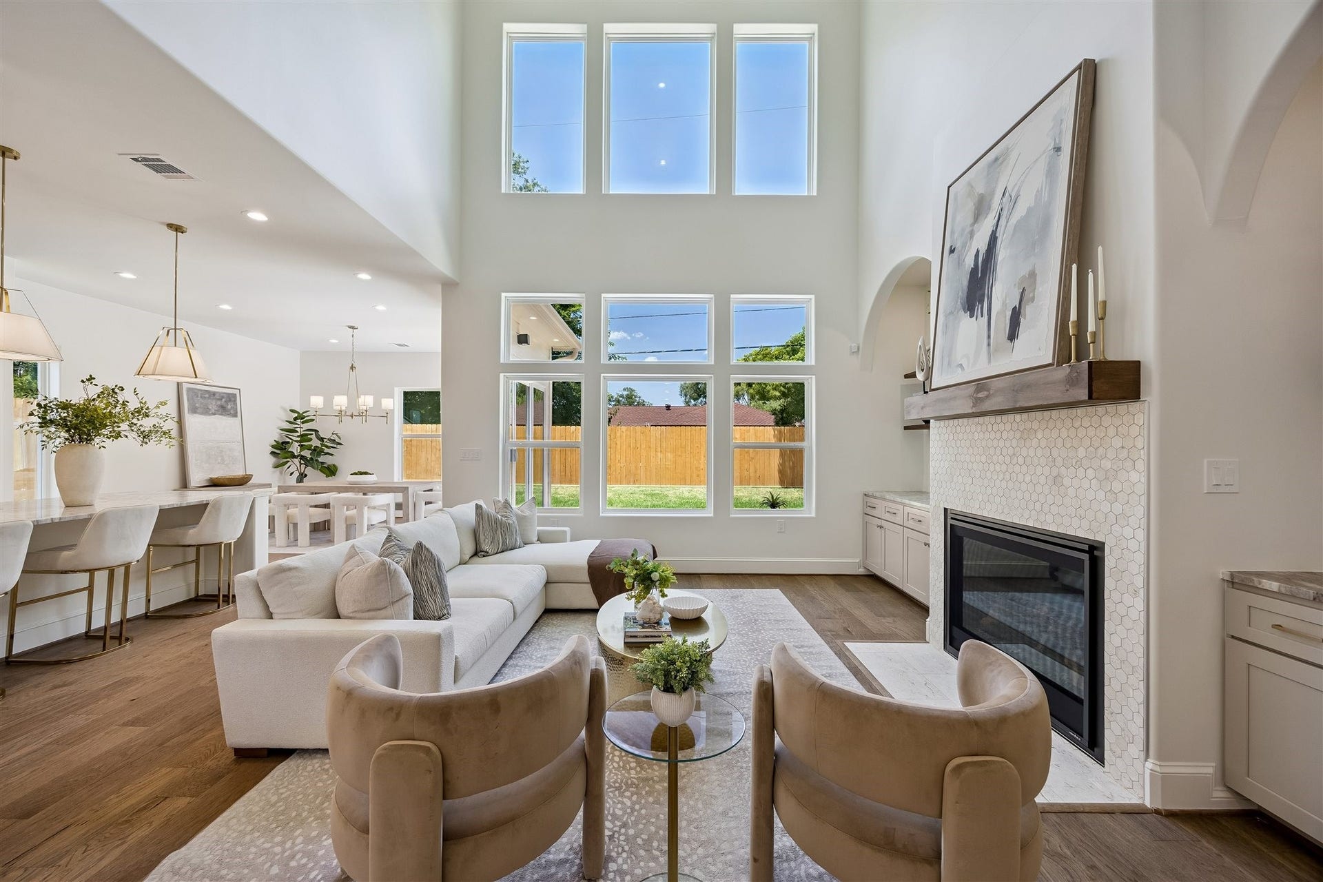 Gorgeous living room on 1st floor perfect for entertaining and off of kitchen with a gas log fireplace