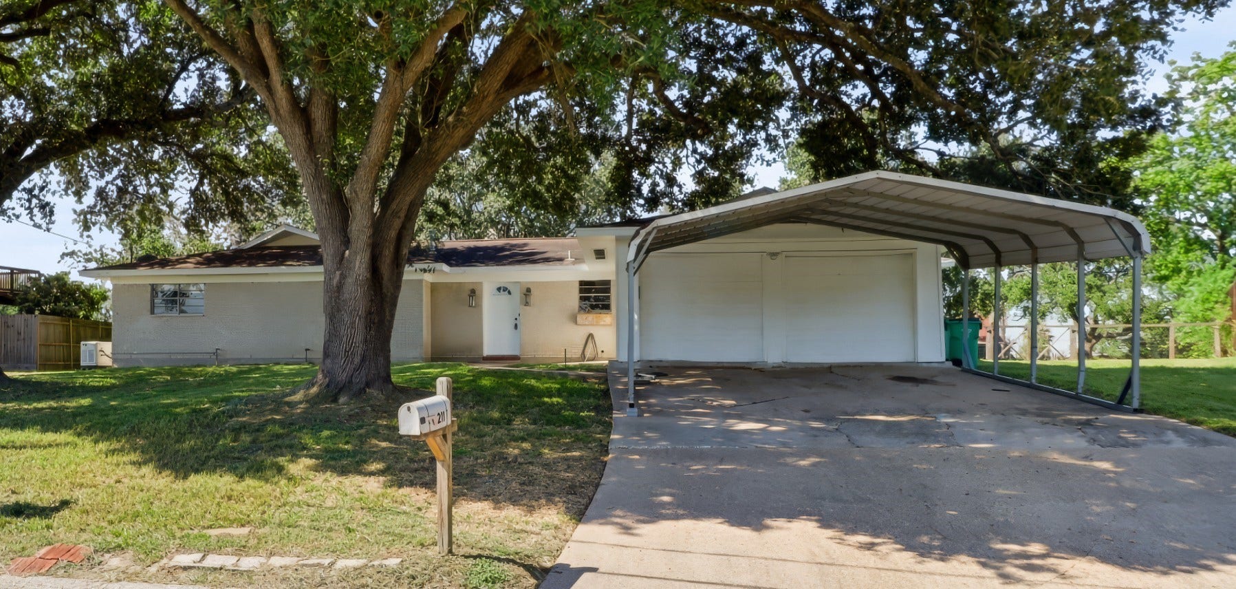 211 Rue Orleans Street, Baytown, TX 77520 211 Rue Orleans 5 bed 2.5 bath 2 car garage and carport - no HOA - NO MUD