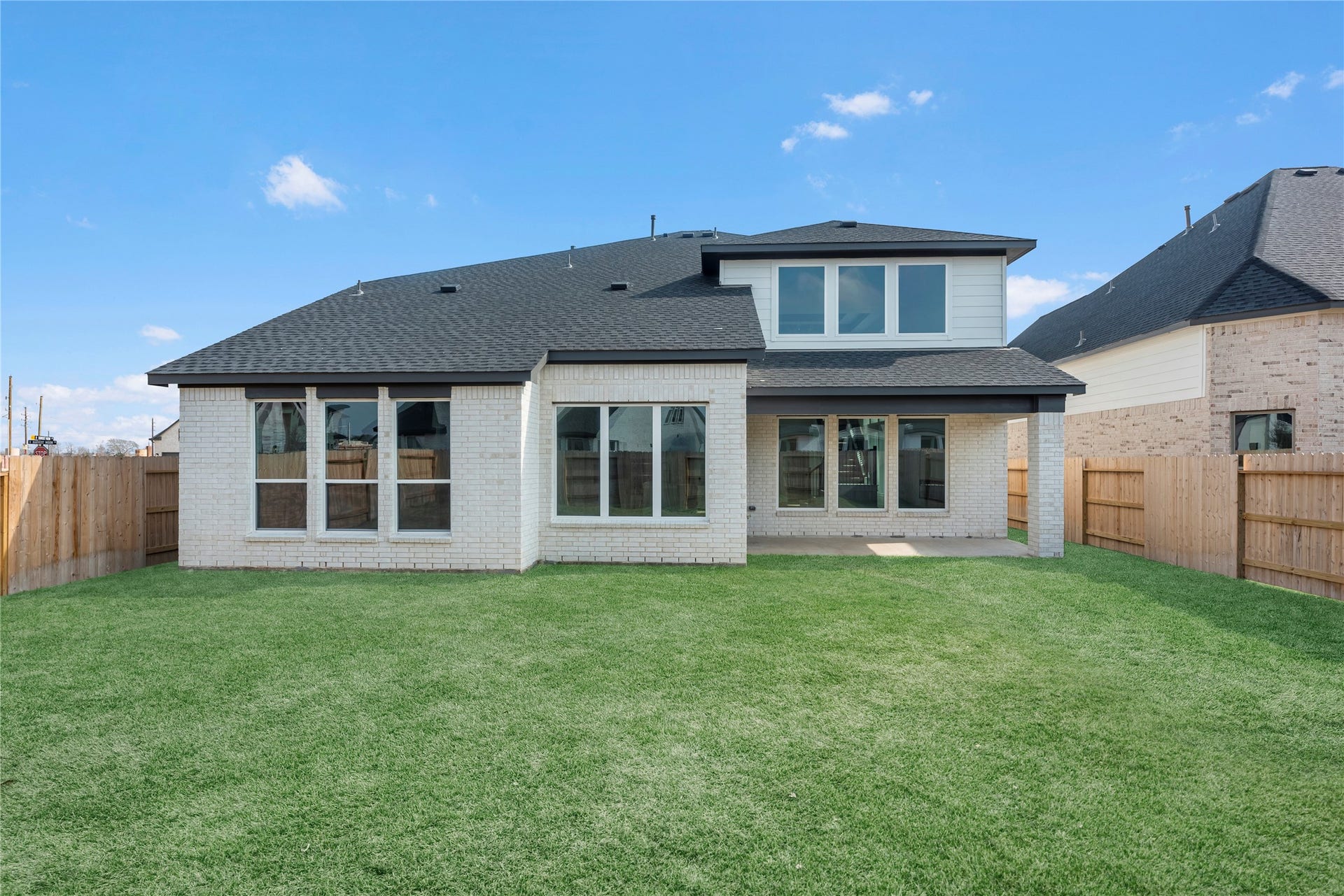 413 Harvest Moon Drive, Katy, TX 77493 Grass is digitally enhanced.