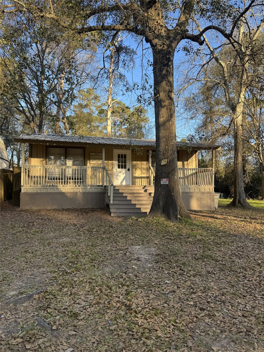 Property photo for 705 Smokey River Bend, Conroe, TX