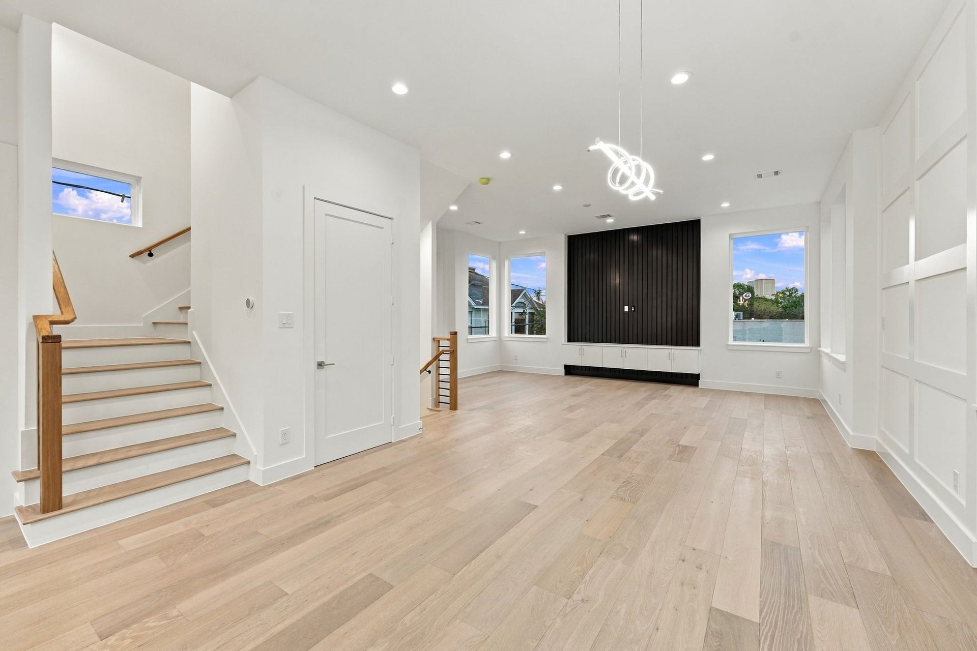 1110 Peden Street, #A or B, Houston, TX 77006 Wide stairs, half bathroom, tall ceilings, accent walls, and built in cabinets.