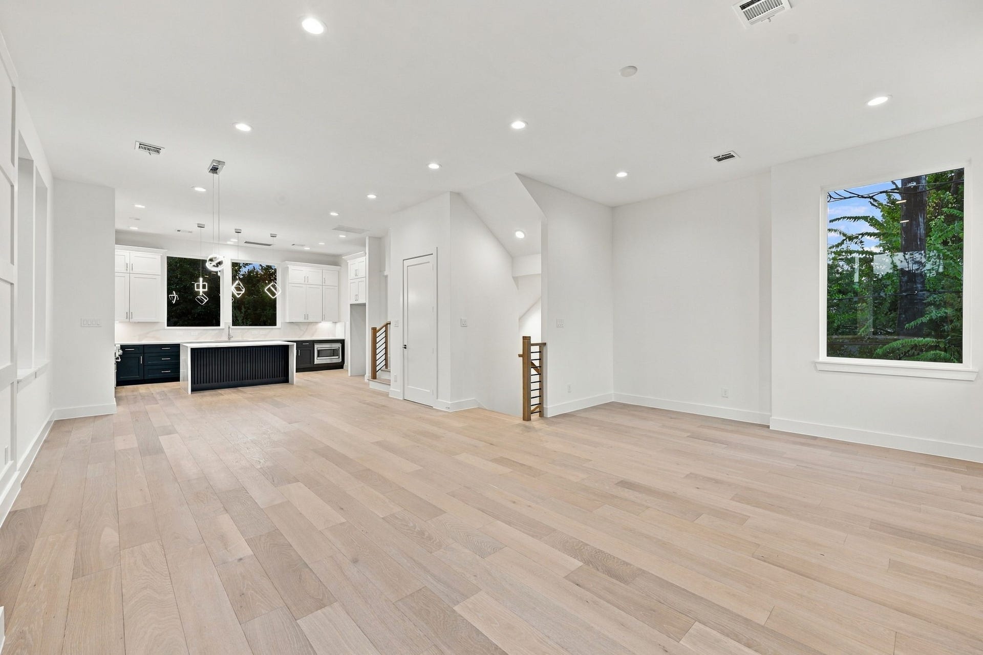1110 Peden Street, #A or B, Houston, TX 77006 Notice all the recessed lighting, wide plank flooring, and oversized living area.