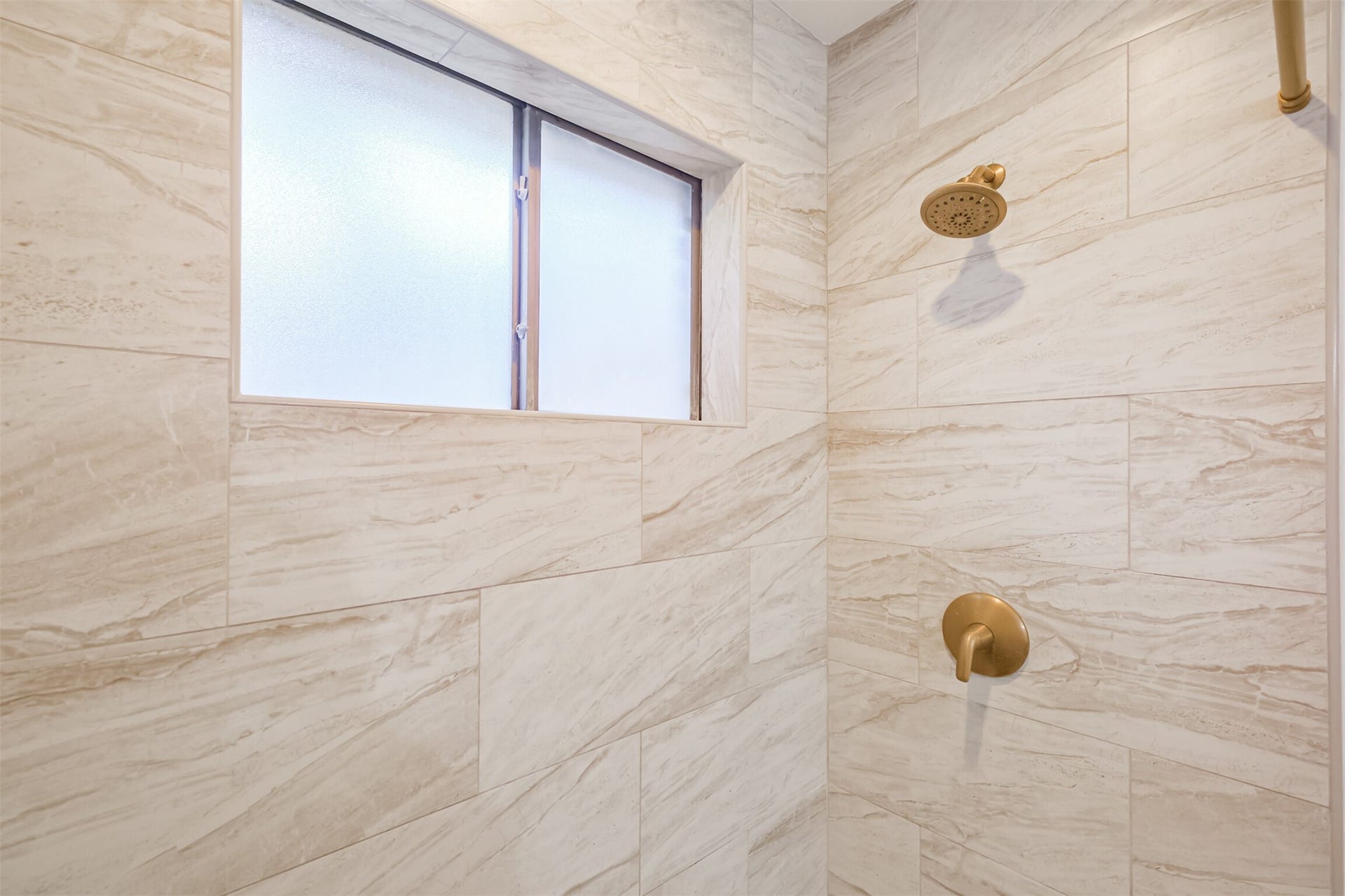 14211 Swiss Hill Drive, Houston, TX 77077 A closer look at the updated tile surround in the primary shower.