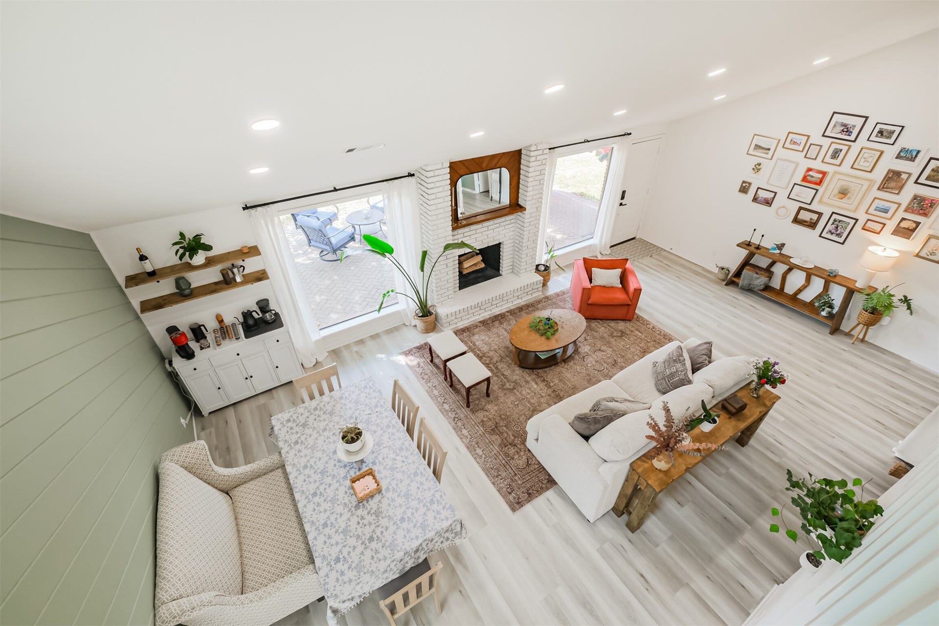 14211 Swiss Hill Drive, Houston, TX 77077 When you walk into this home you are greeted by laminate floors that flow throughout the first floor living spaces. As you can see from this photo the family room is very spacious.