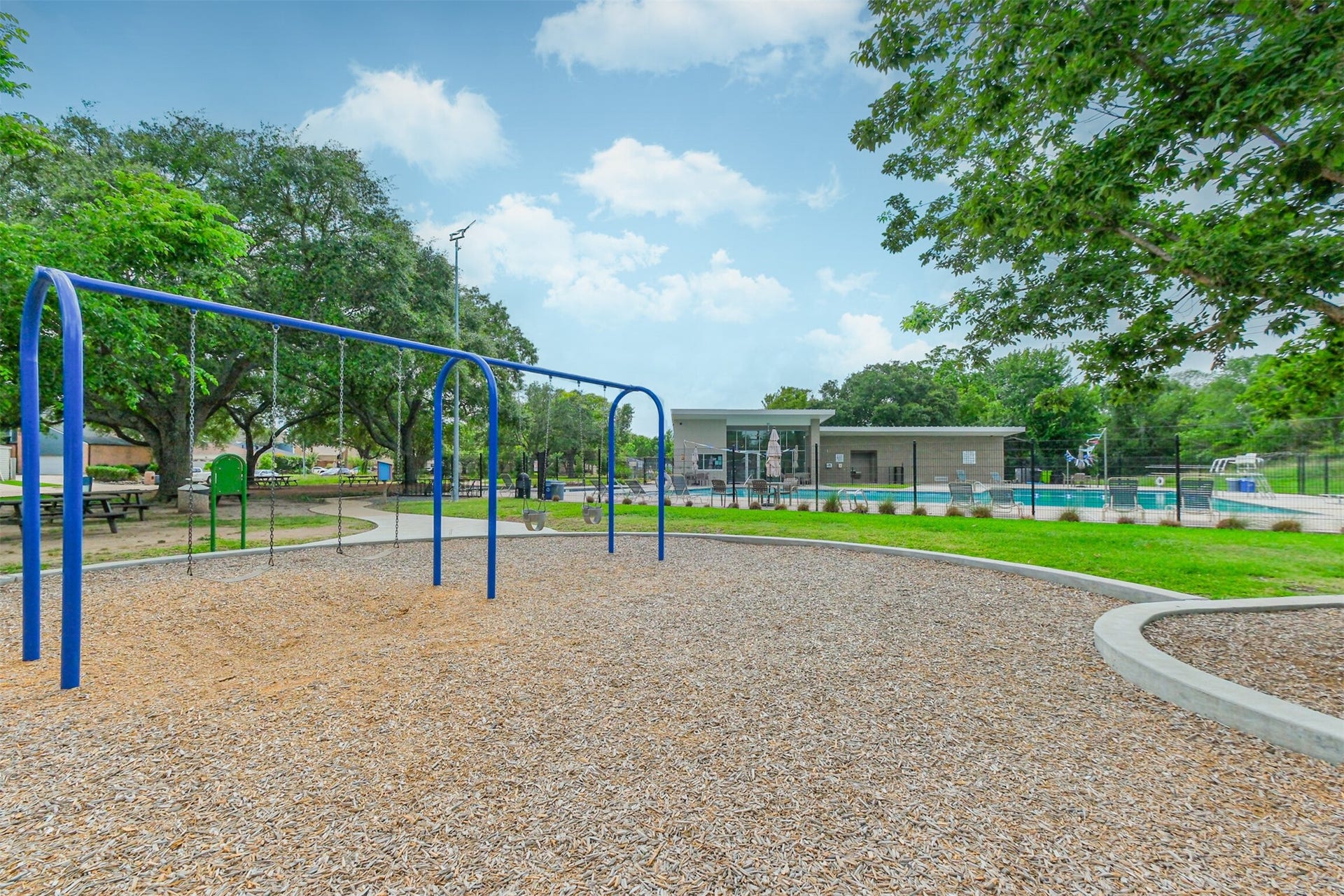 14211 Swiss Hill Drive, Houston, TX 77077 There are also swings.