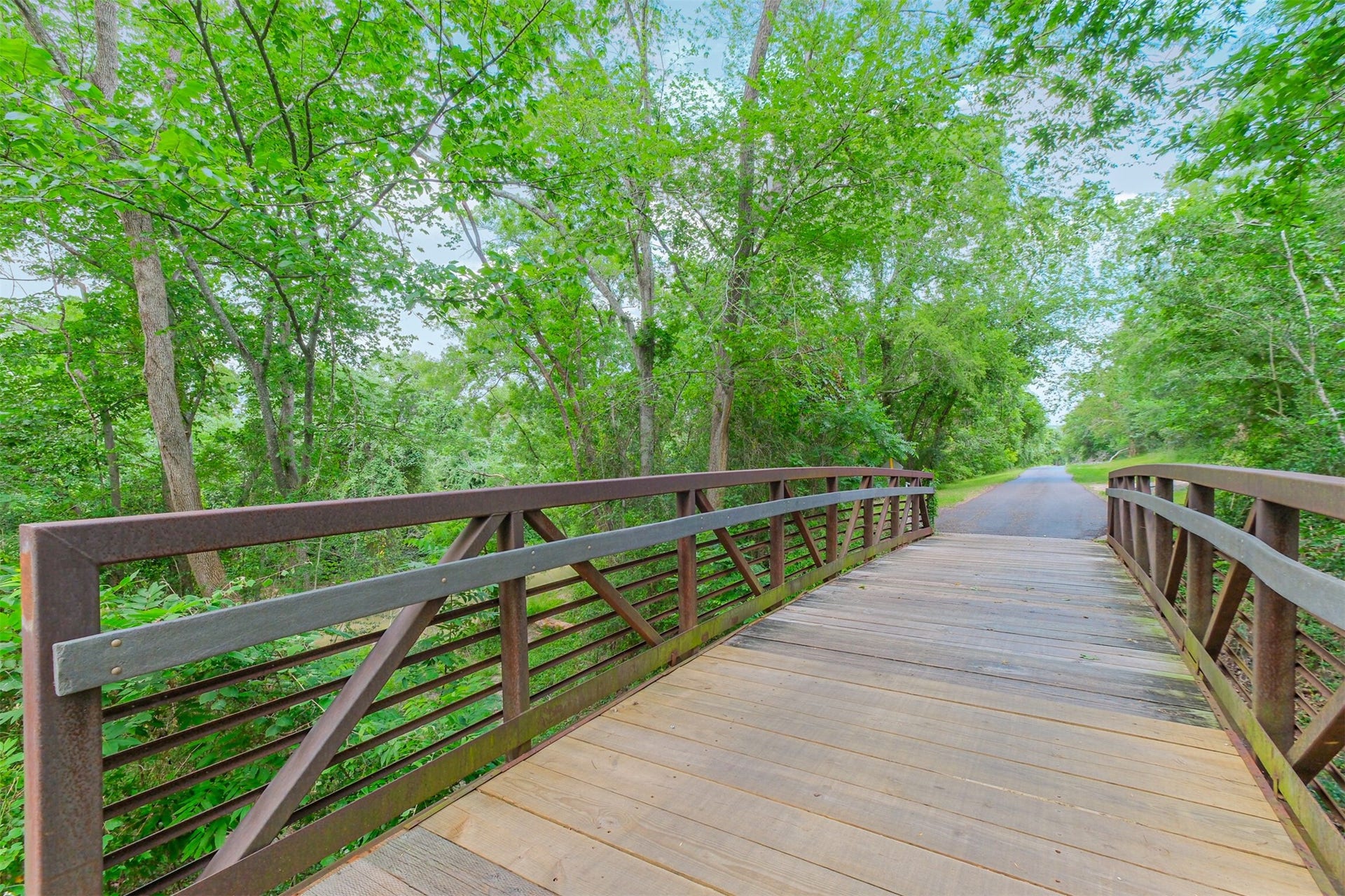 14211 Swiss Hill Drive, Houston, TX 77077 There are approximately 12.5 miles of hike and bike trails including side trails that stretches from Barker Dam, east along Buffalo Bayou to Beltway 8 near junction of Rummel Creek and Buffalo Bayou.