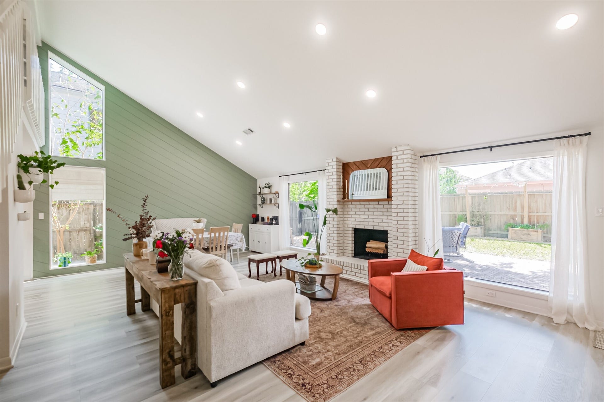 14211 Swiss Hill Drive, Houston, TX 77077 The family room has high ceilings, LED recessed lighting and a fireplace.