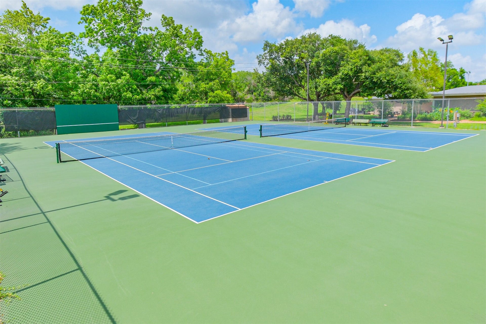 14211 Swiss Hill Drive, Houston, TX 77077 The tennis courts can be reserved by homeowners and renters in Briarhills.