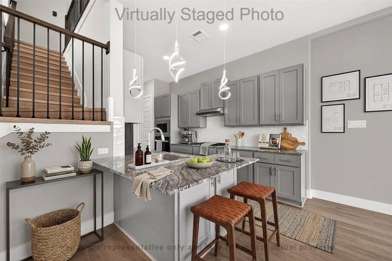 10719 Mason Rd, #32, Richmond, TX 77406 Virtual Staging - Open-concept kitchen featuring grey cabinetry, granite countertops, a small peninsula with woven leather stools, and striking spiral pendant lights