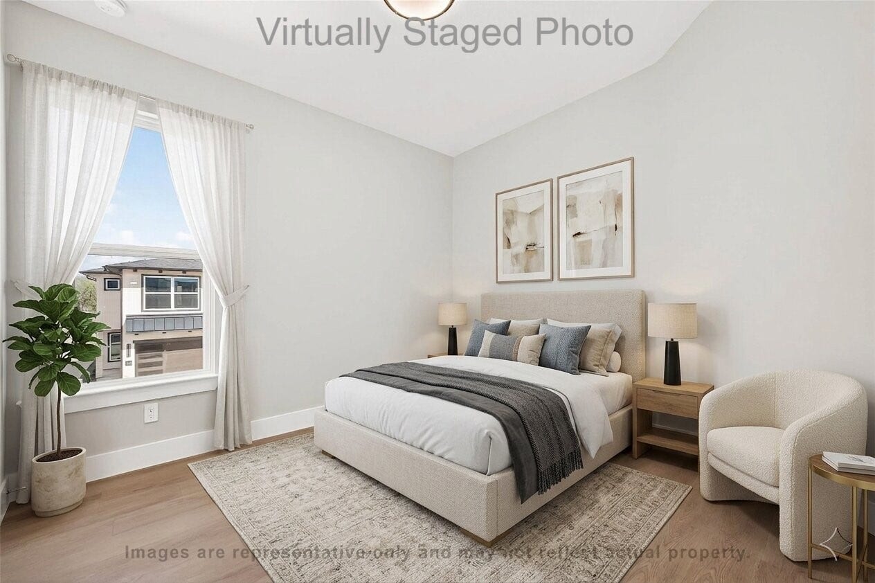 10719 Mason Rd, #32, Richmond, TX 77406 Virtual Staging - Neutral bedroom featuring an upholstered bed, matching wood nightstands, a cozy cream armchair, and a large window dressed with sheer white curtains