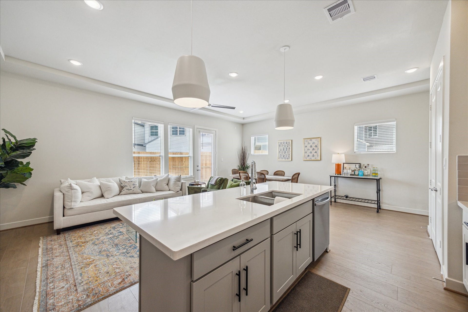 24405 Colonial Willow Drive, Katy, TX 77493 Representative photo showing the communitys model home kitchen. Layout and selections may vary.