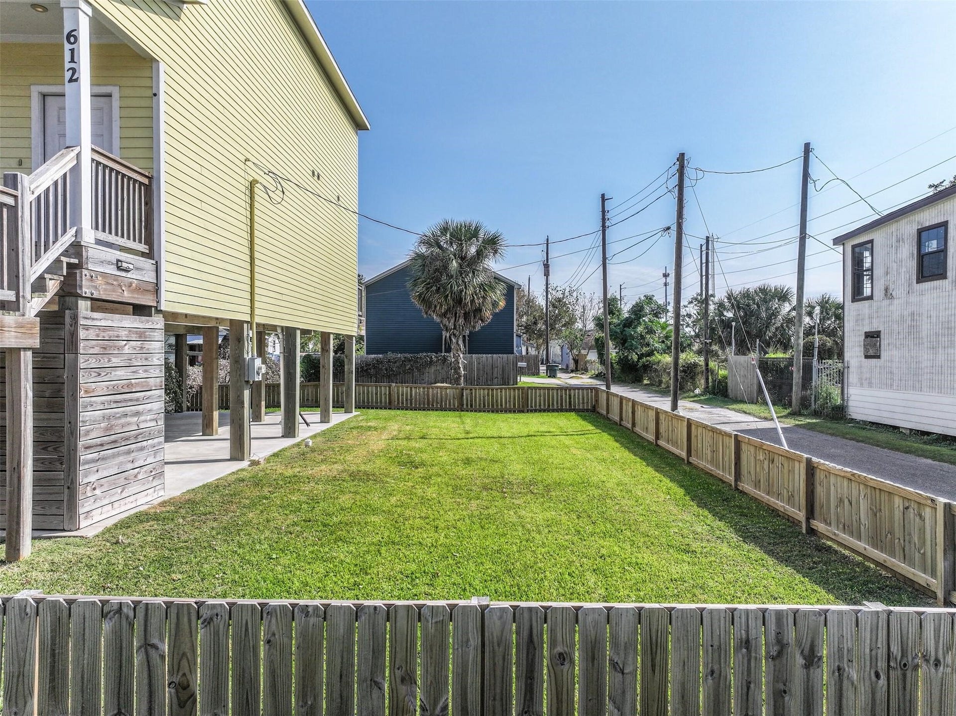 614 38th Street, Galveston, TX 77550 A street-level view of the cleared lot.