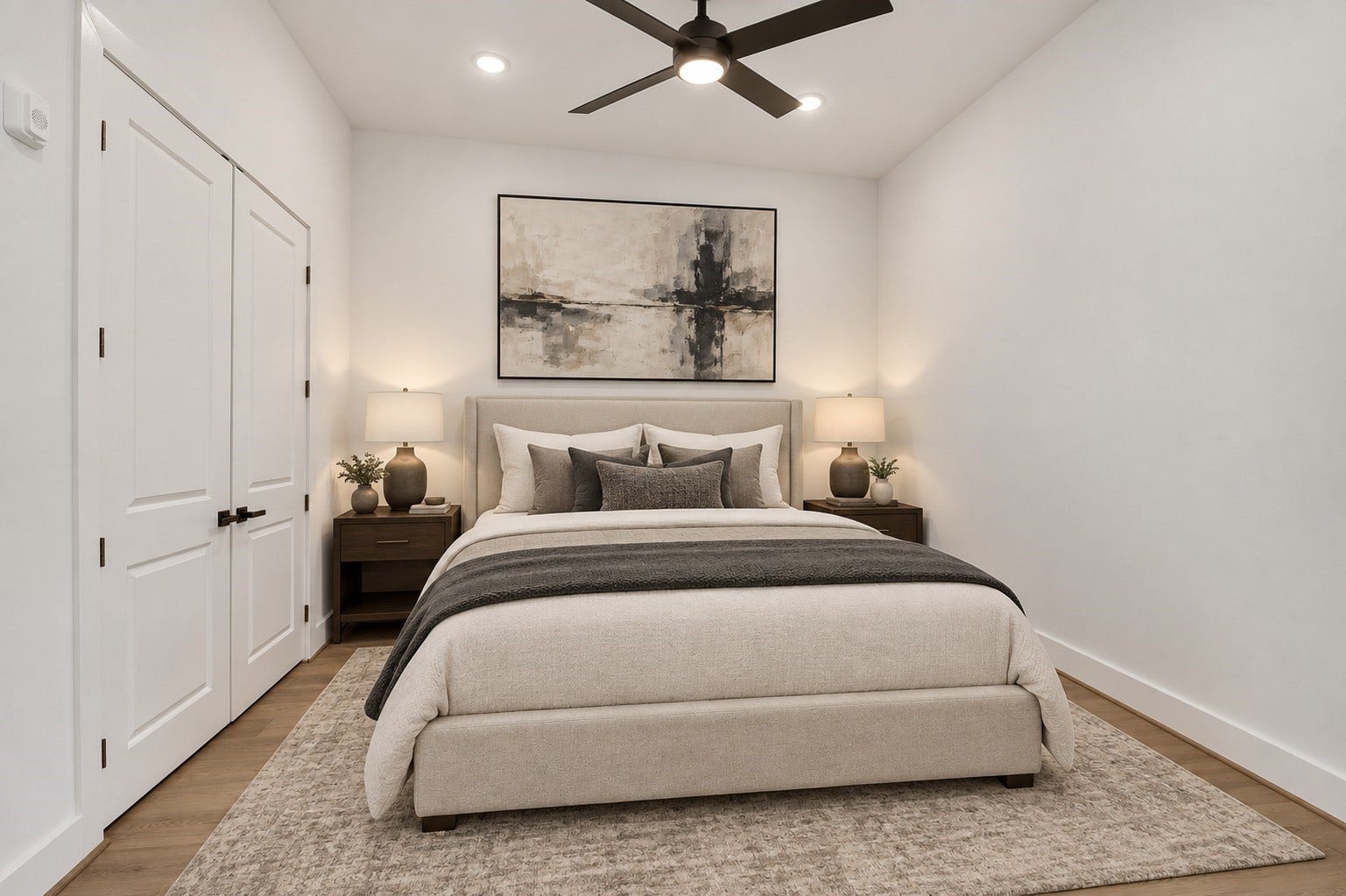 119 Kirby Road, #5303, Taylor Lake Village, TX 77586 Elegant bedroom with a cozy bed, stylish artwork, and warm lighting, offering a serene retreat. (Virtually staged room).