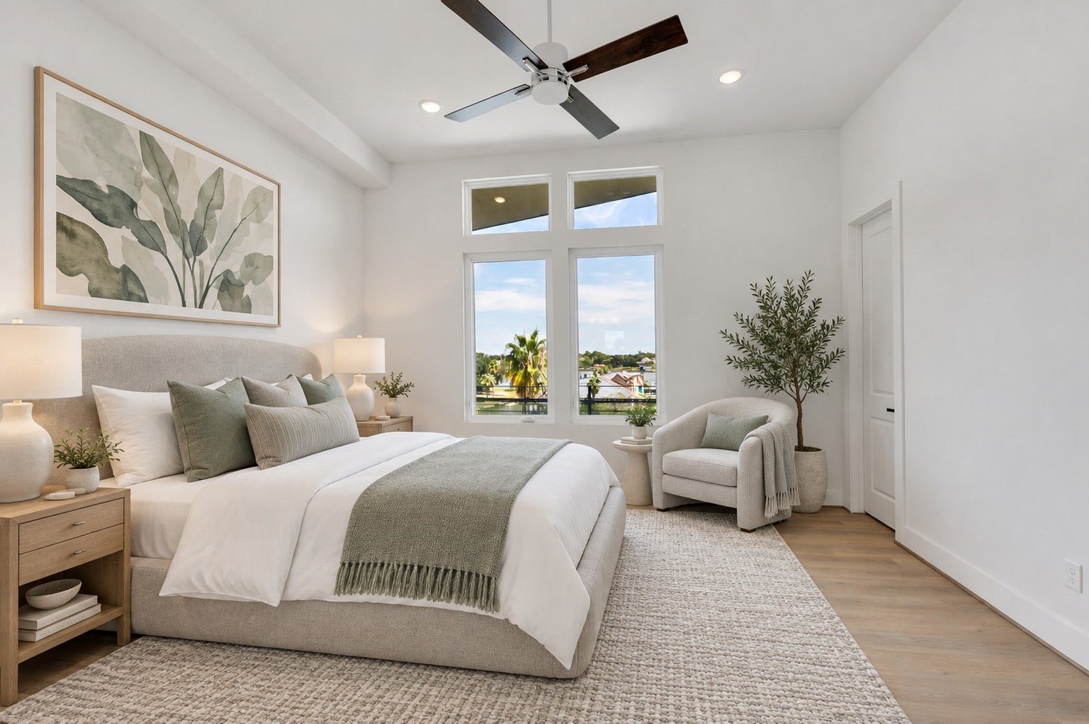 119 Kirby Road, #5303, Taylor Lake Village, TX 77586 Bright and airy bedroom featuring large windows, a cozy upholstered bed, and stylish decor with natural accents. (Virtually staged room).