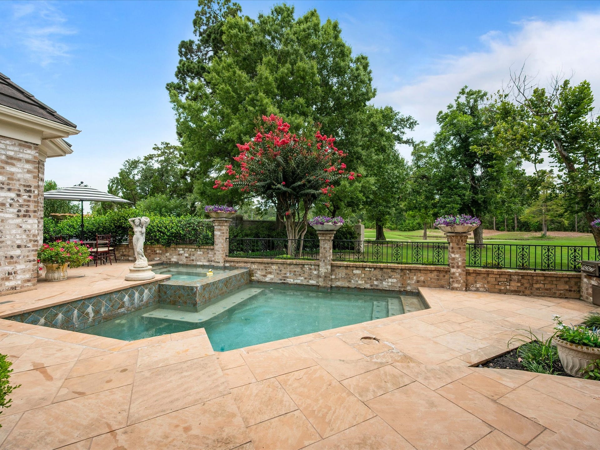 Mature trees, vibrant seasonal blooms, and picturesque golf course views create a truly breathtaking setting, where every day feels like a private retreat.