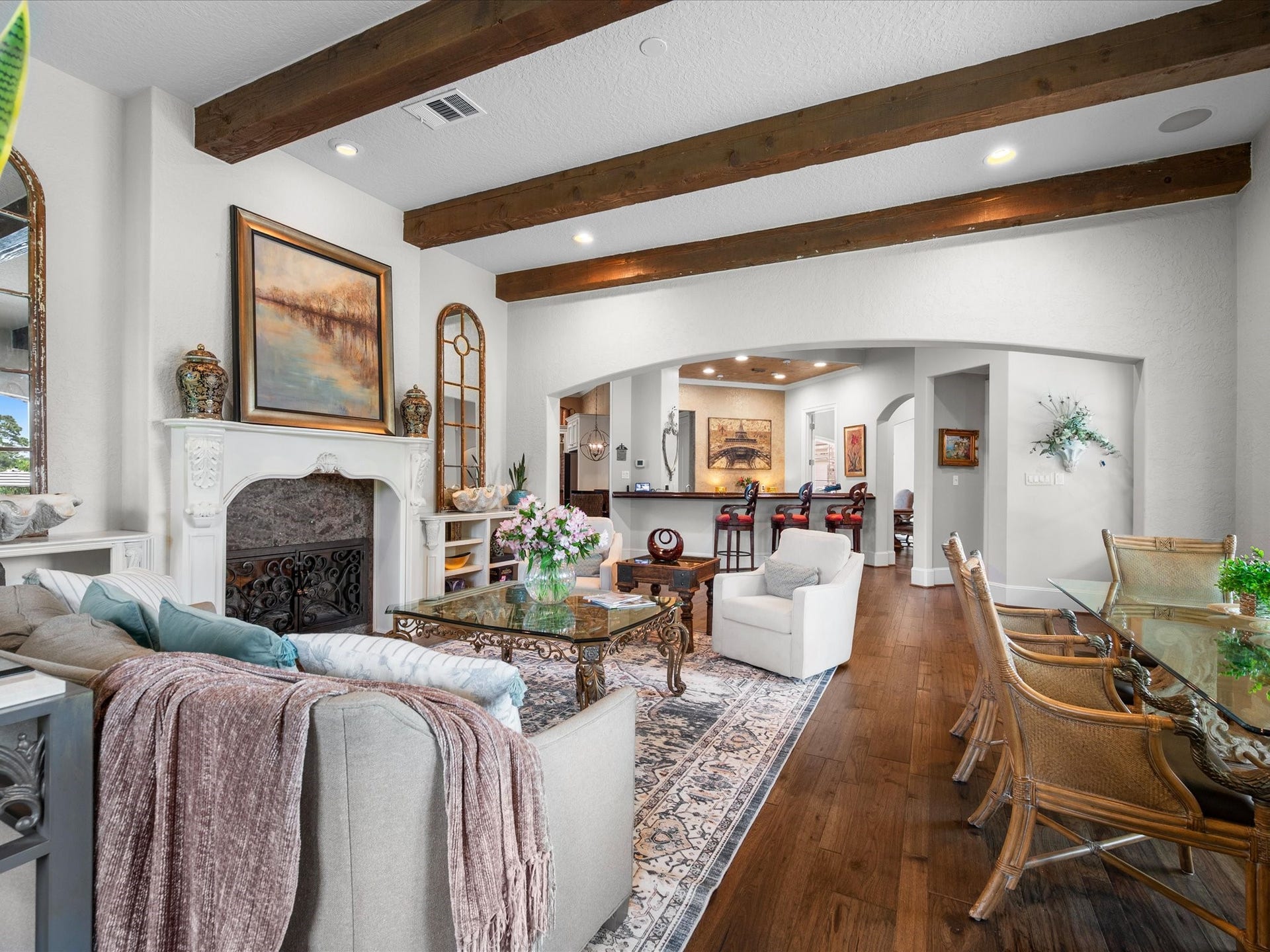 Designed for effortless entertaining, the family room seamlessly connects to an inviting wet bar, offering the perfect setting for hosting family and friends.