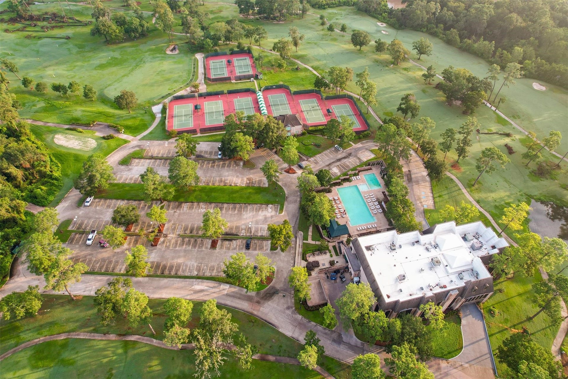Residents enjoy access to the exceptional amenities of Northgate Forest Country Club, including swimming, tennis, and an active social atmosphere.