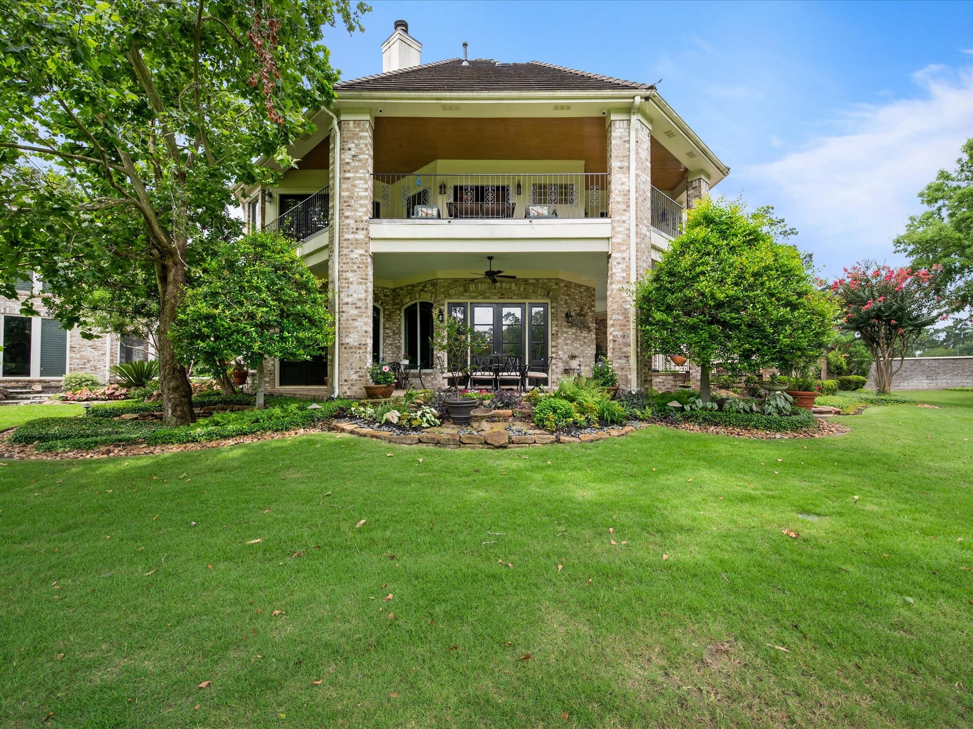 Overlooking the golf course from both the balcony and patio, this remarkable outdoor setting offers a rare sense of serenity, privacy, and connection to nature.