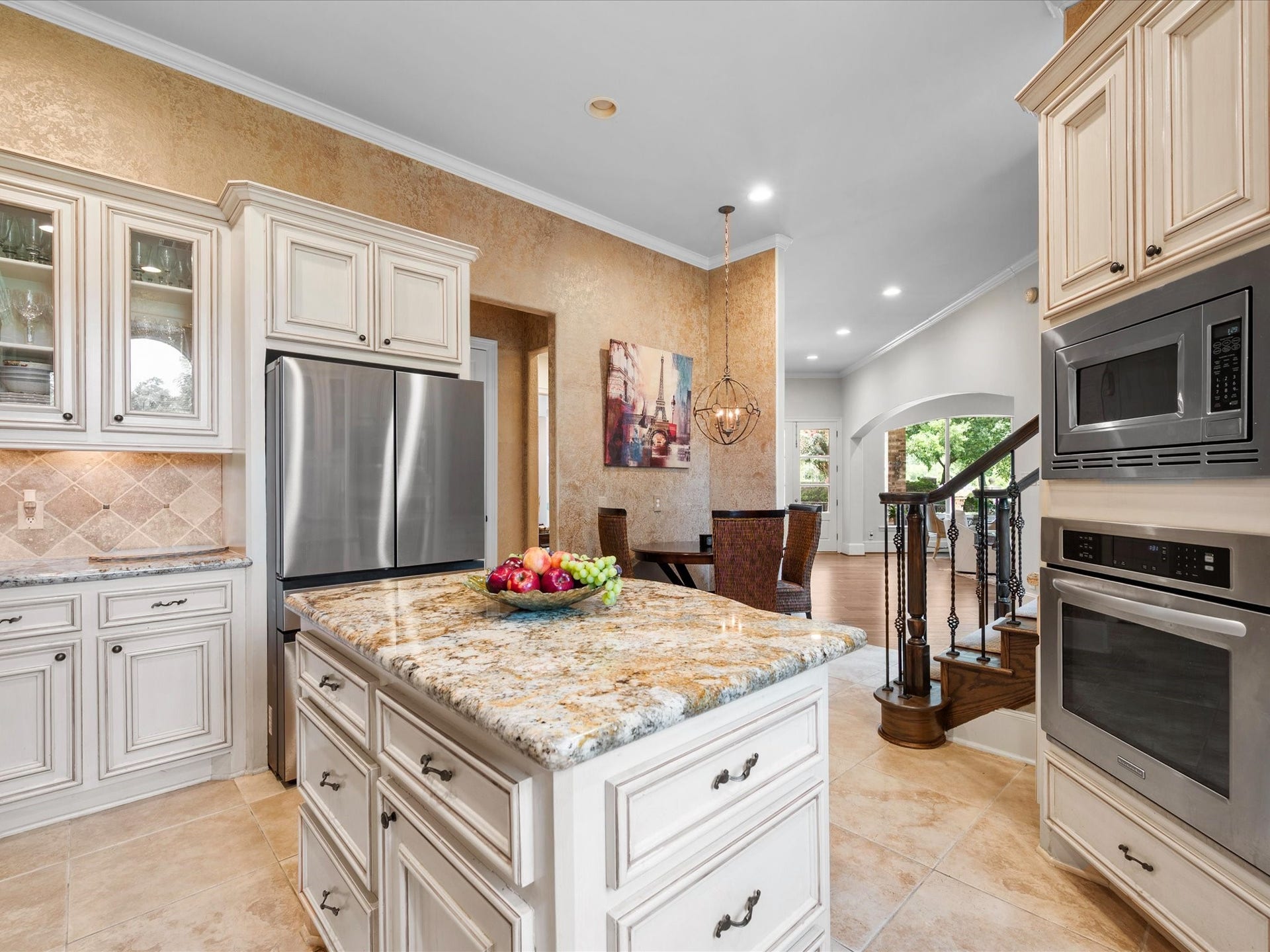 A thoughtfully designed open layout creates a seamless flow between living spaces, perfectly balancing elegant entertaining with comfortable everyday living.