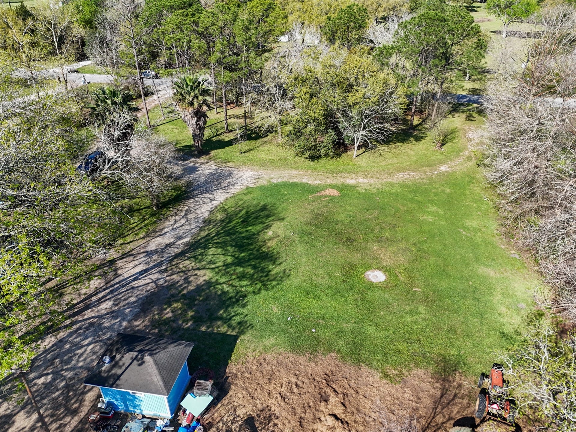 1227 Ave L, Santa Fe, TX 77510 View showing the circle drive and exit from property