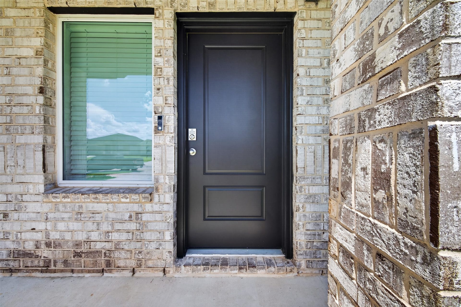 31214 Carmelas Landing Drive, Fulshear, TX 77441 View of the front door and window