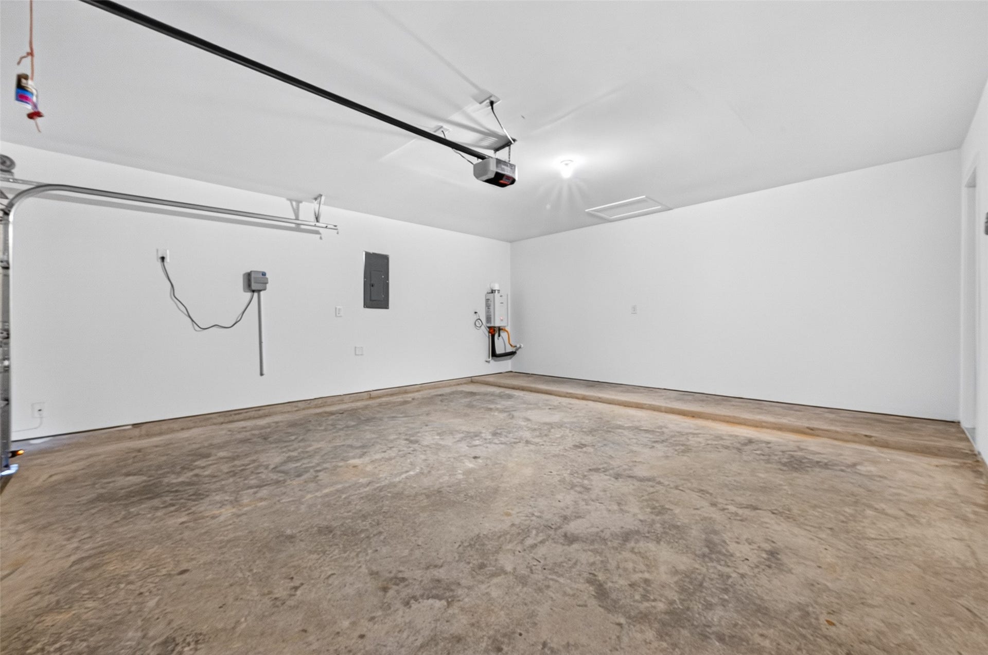 31214 Carmelas Landing Drive, Fulshear, TX 77441 2 Car spacious garage with garage door opener and sprinkler system