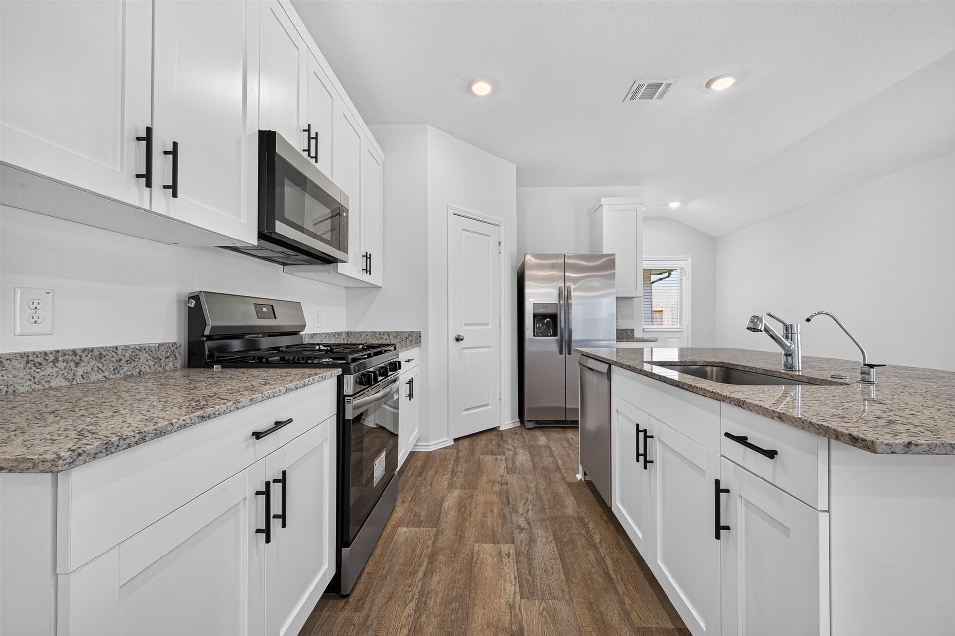 31214 Carmelas Landing Drive, Fulshear, TX 77441 View of kitchen cabinets and knobs